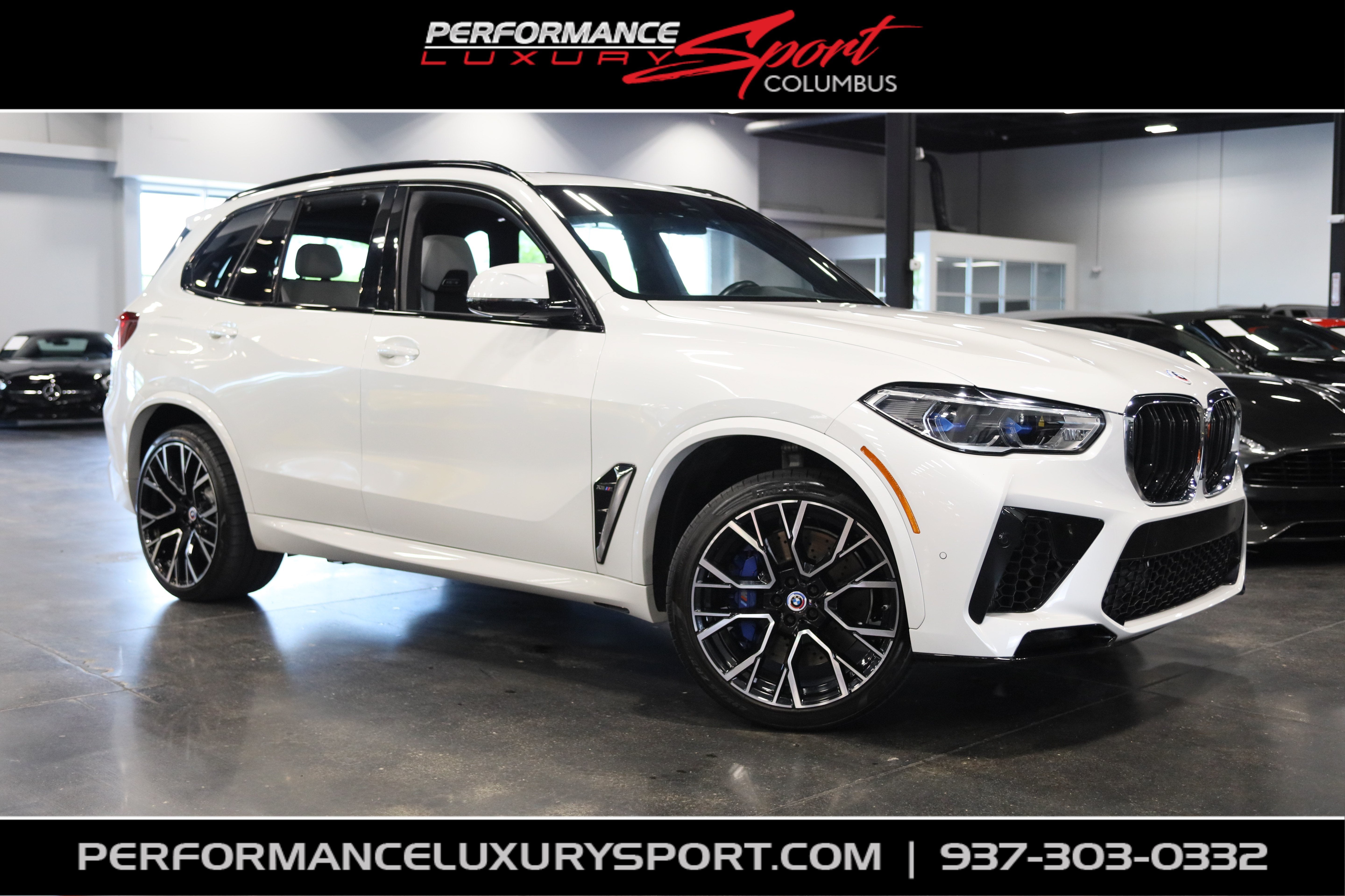 2023 BMW X5 M Base in Mineral White Metallic — front three-quarter view