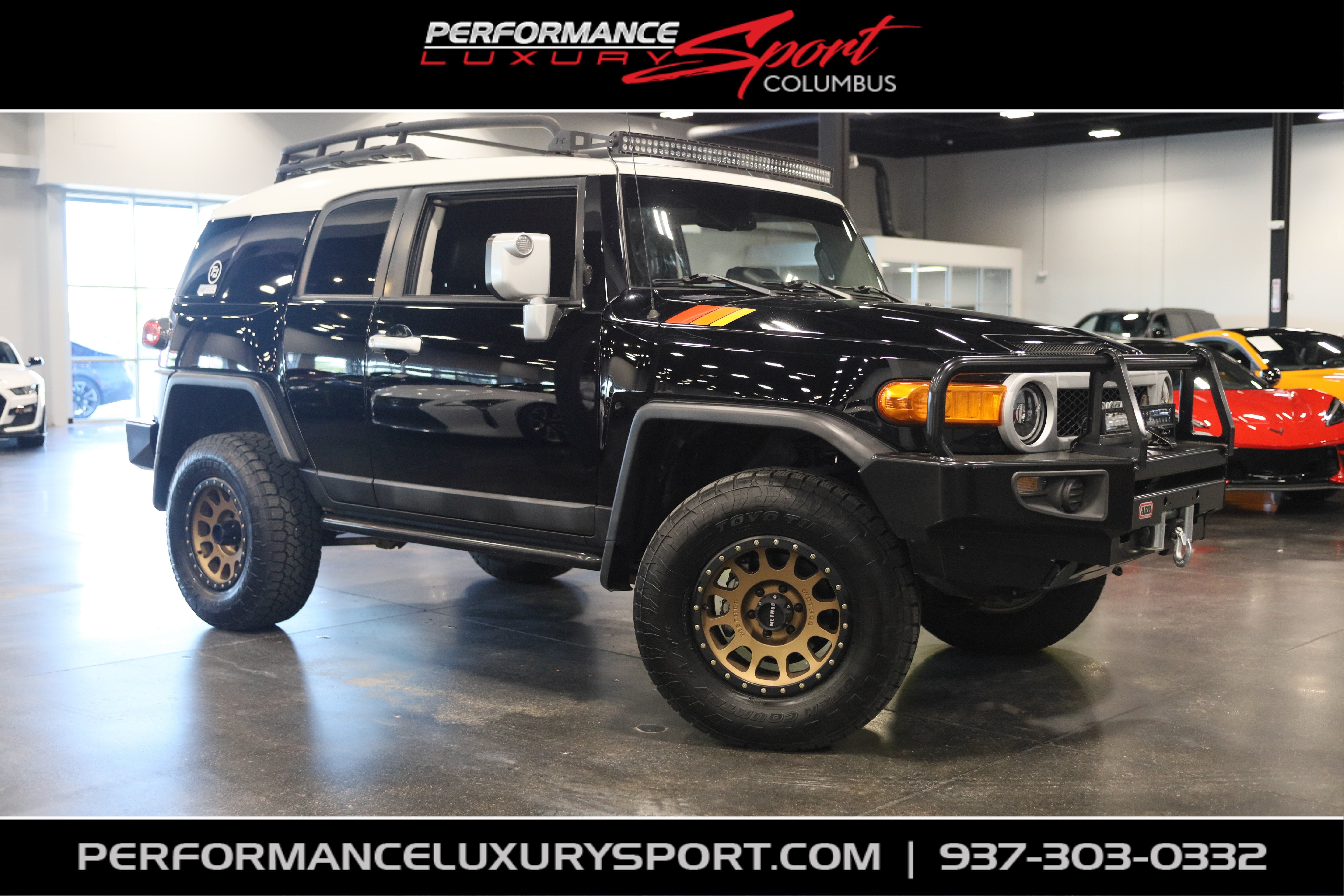 2012 Toyota FJ Cruiser 4WD 4dr Auto (Natl) in Black — front three-quarter view