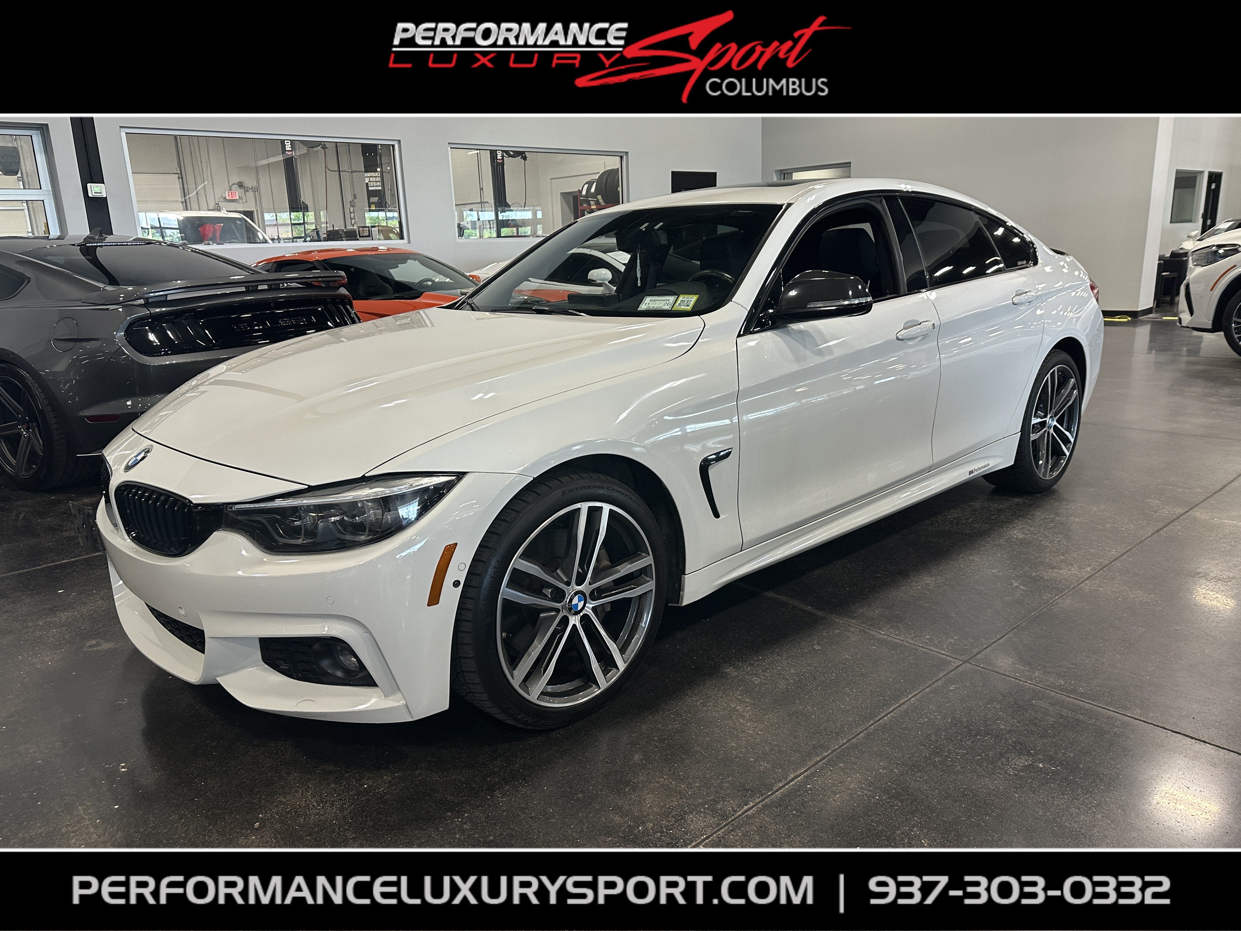 2019 BMW 4 Series 440i xDrive in Alpine White — front three-quarter view
