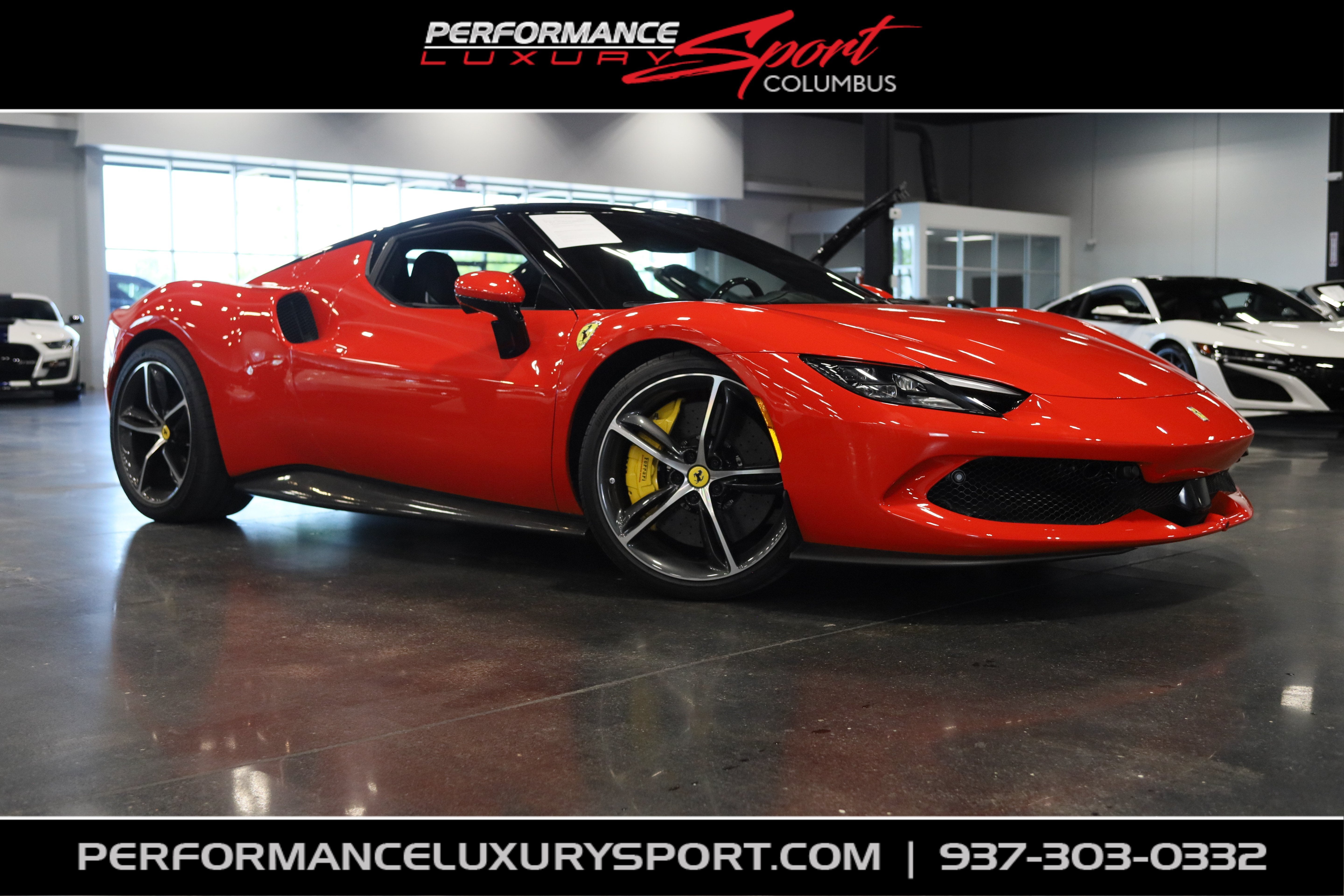 2025 Ferrari 296 GTB Base in Rosso Scuderia — front three-quarter view