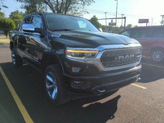 2019 RAM 1500 Limited in Diamond Black Crystal Pearlcoat — front three-quarter view