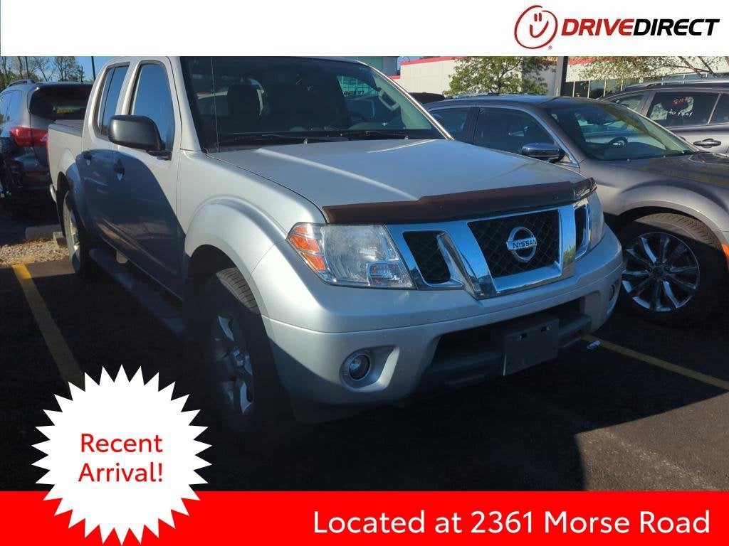 2013 Nissan Frontier SV in Brilliant Silver Metallic — front three-quarter view