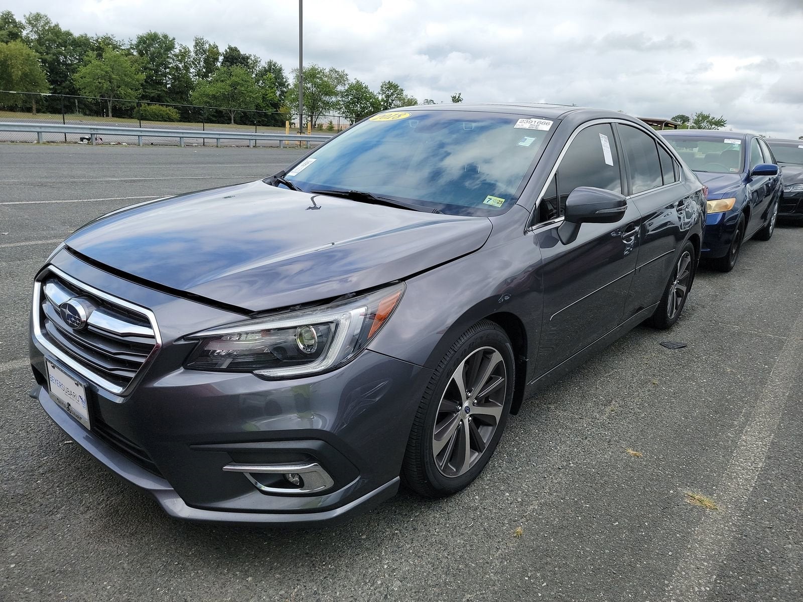 2018 Subaru Legacy 3.6R in Magnetite Gray Metallic — front three-quarter view