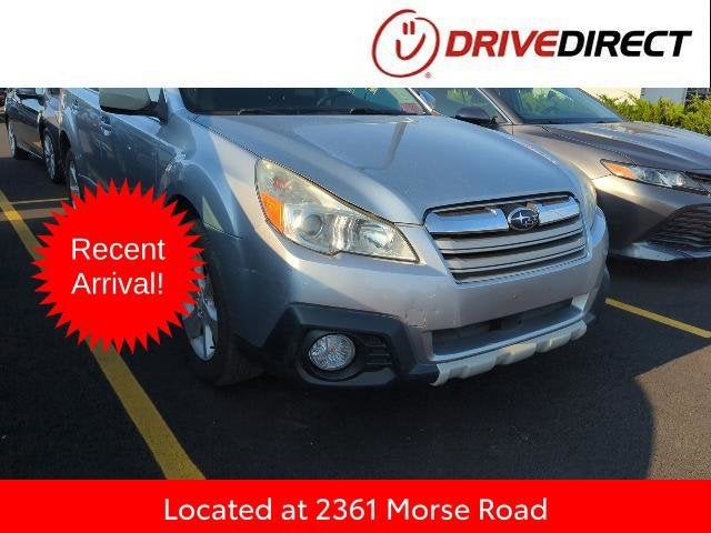 2013 Subaru Outback 2.5i in Ice Silver Metallic — front three-quarter view