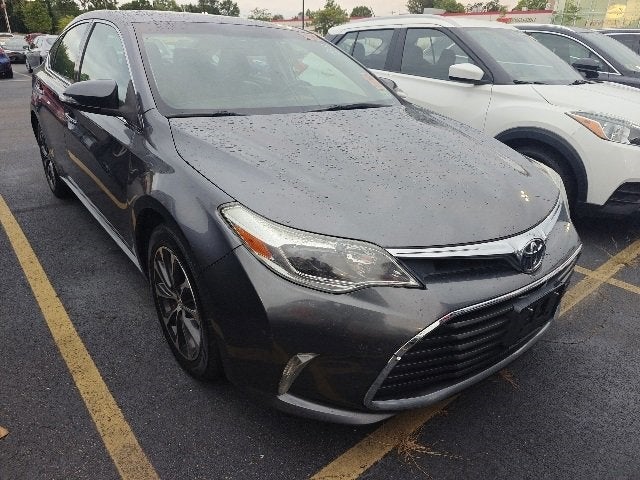 2016 Toyota Avalon XLE in Magnetic Gray Metallic — front three-quarter view