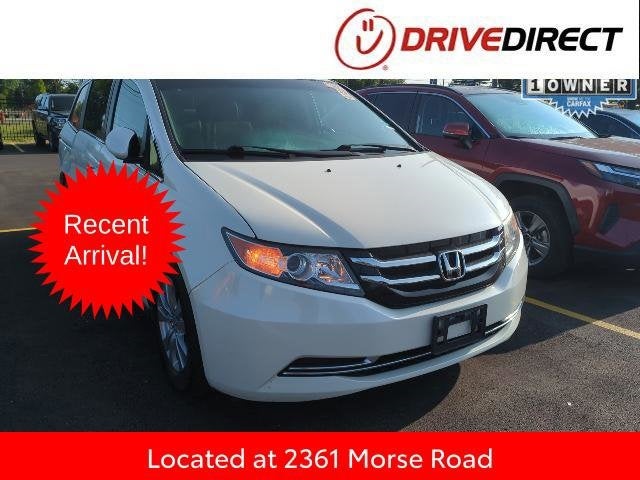 2016 Honda Odyssey SE in White Diamond Pearl — front three-quarter view