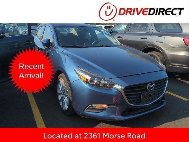 2017 Mazda Mazda3 Touring in Eternal Blue Mica — front three-quarter view