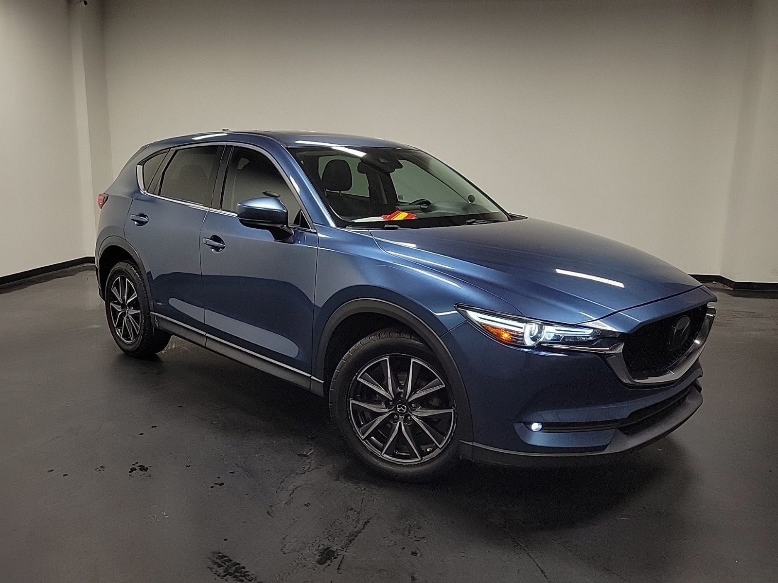2018 Mazda Mazda CX-5 Grand Touring in Eternal Blue Mica — front three-quarter view