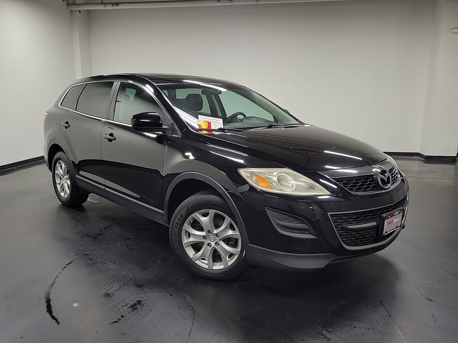 2012 Mazda Mazda CX-9 Touring in Brilliant Black Clearcoat — front three-quarter view