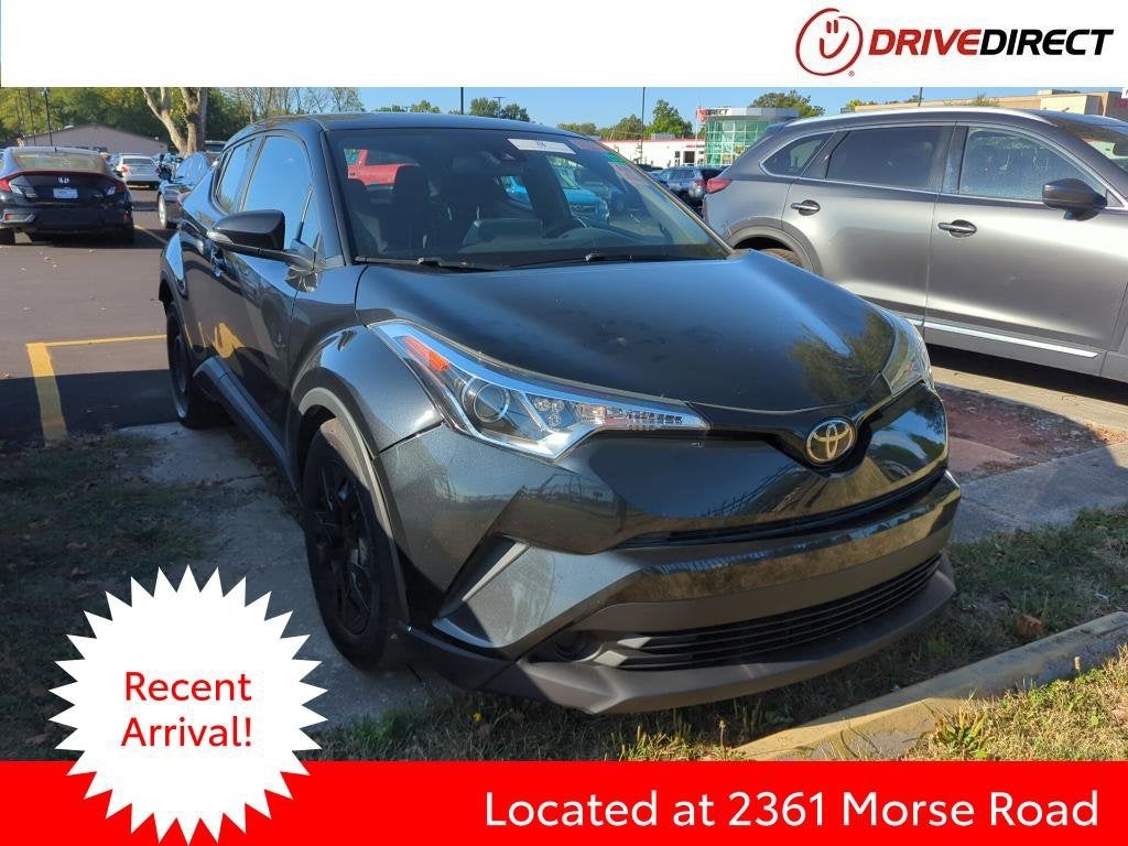 2019 Toyota C-HR LE in Black Sand Pearl — front three-quarter view