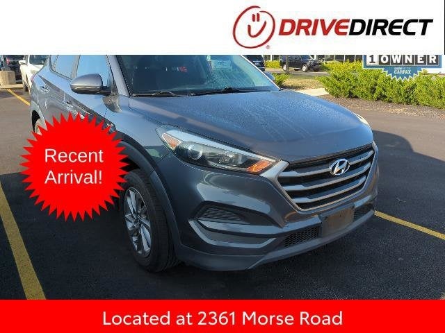2018 Hyundai Tucson SE in Coliseum Gray — front three-quarter view