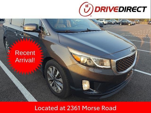 2015 Kia Sedona SX in Platinum Graphite — front three-quarter view