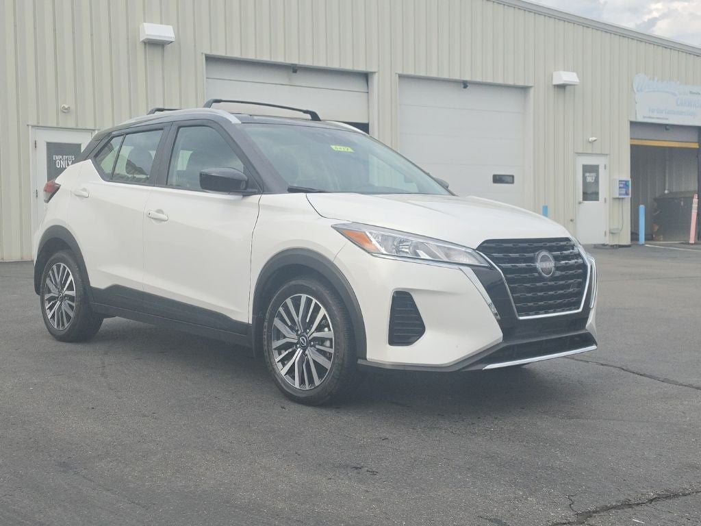 2024 Nissan Kicks SV in Aspen White/Super Black — front three-quarter view