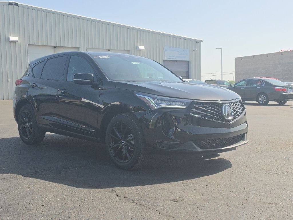 2025 Acura RDX Base SH-AWD in Majestic Black Pearl — front three-quarter view