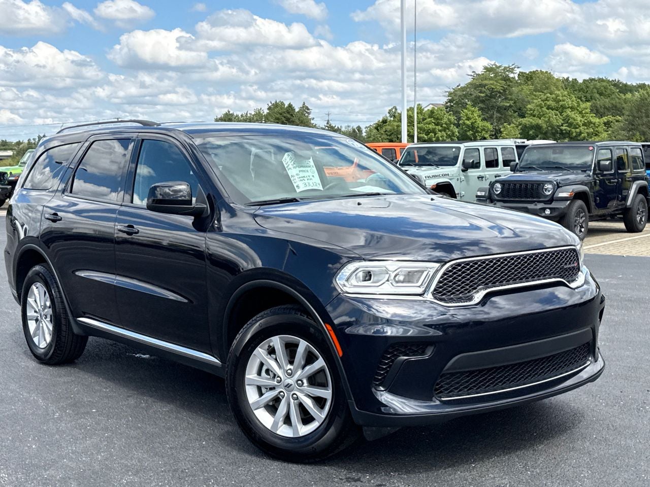 2024 Dodge Durango SXT AWD in Night Moves — front three-quarter view