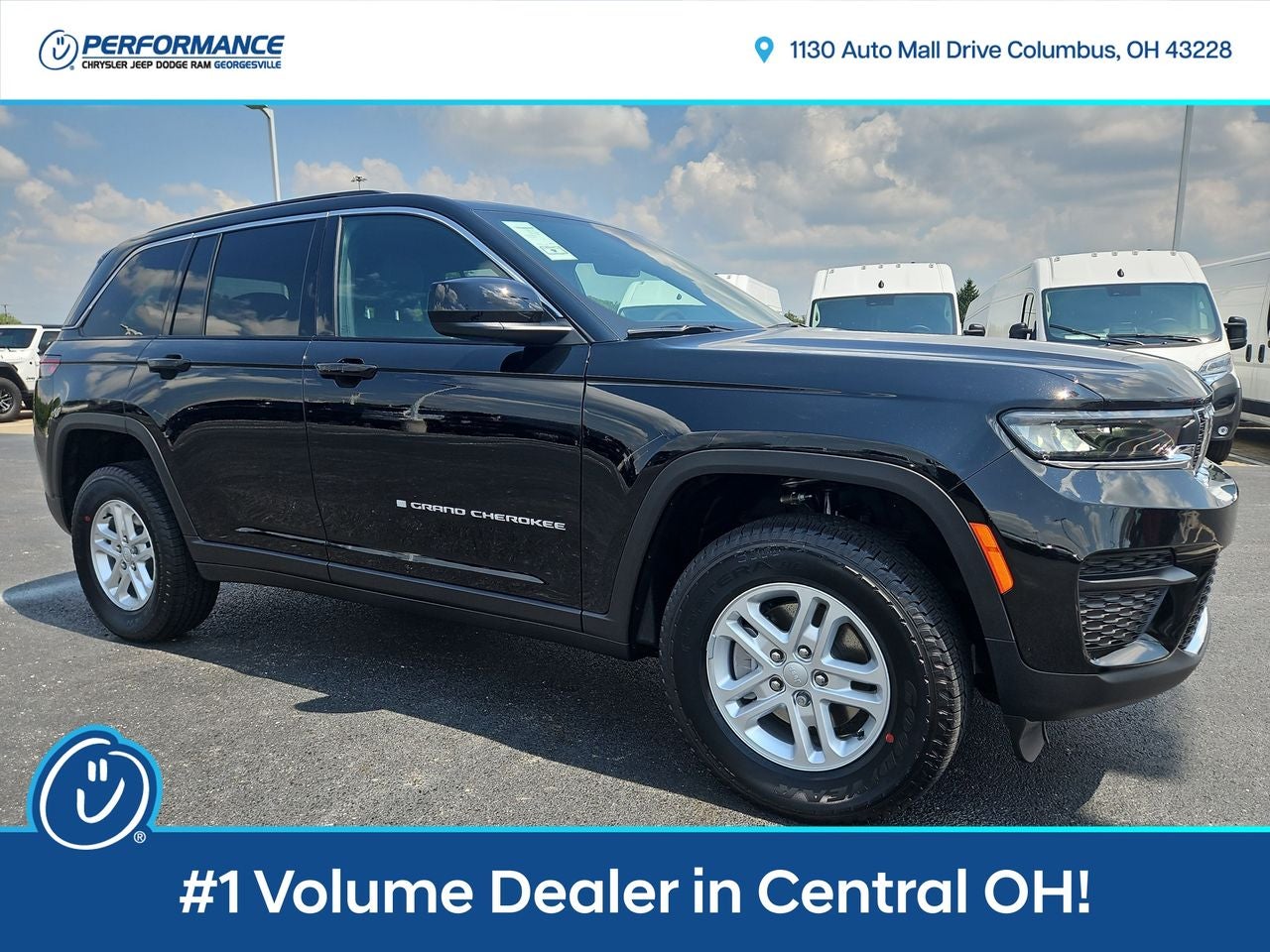 2025 Jeep Grand Cherokee GRAND CHEROKEE LAREDO 4X4 in Diamond Black Crystal Pearl-Coat Exterior Paint — front three-quarter view