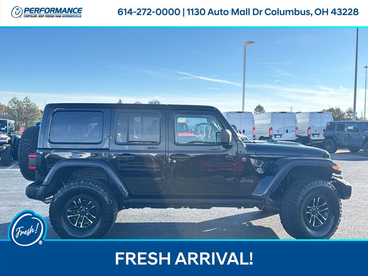 2024 Jeep Wrangler — rear three-quarter view