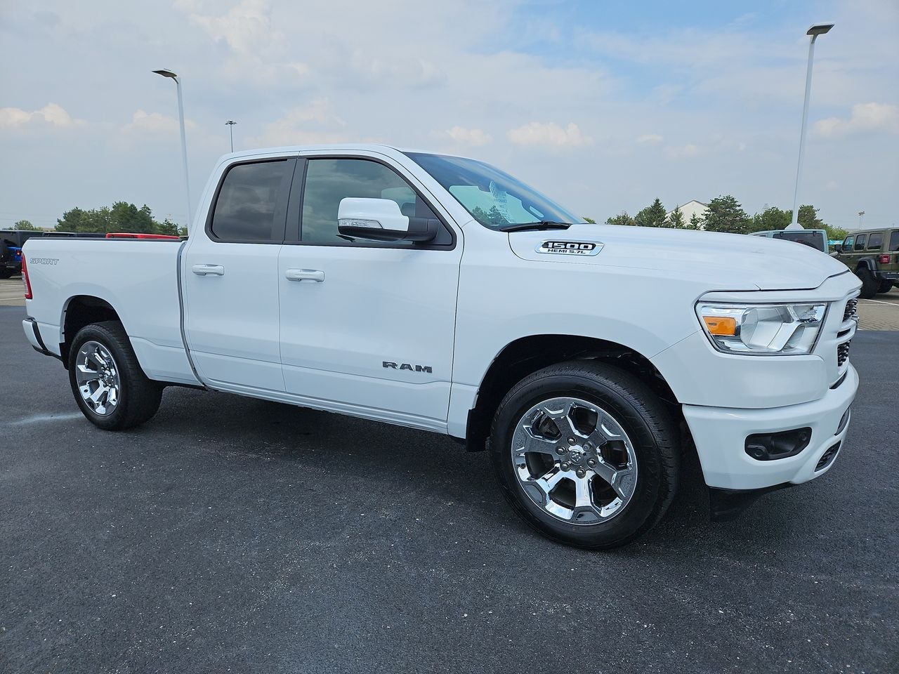 2022 RAM 1500 Lone Star Quad Cab 4x2 6'4' Box in Bright White Clearcoat — front three-quarter view