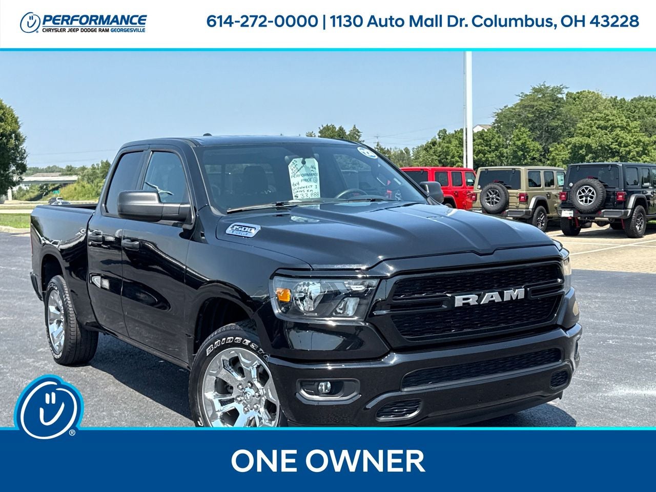 2023 RAM 1500 Tradesman Quad Cab 4x4 6'4' Box in Diamond Black Crystal Pearlcoat — front three-quarter view