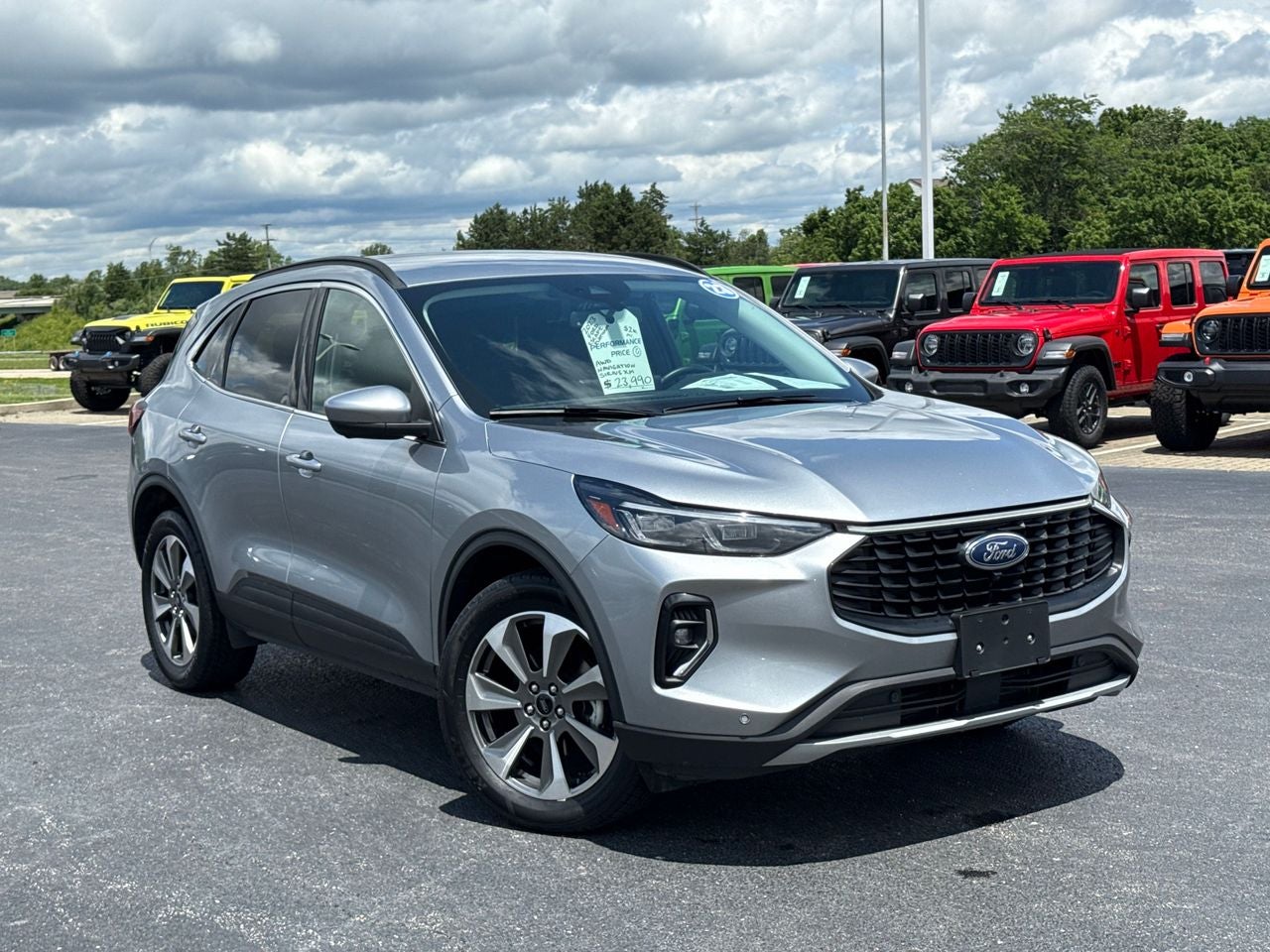 2023 Ford Escape Platinum in Iconic Silver Metallic — front three-quarter view