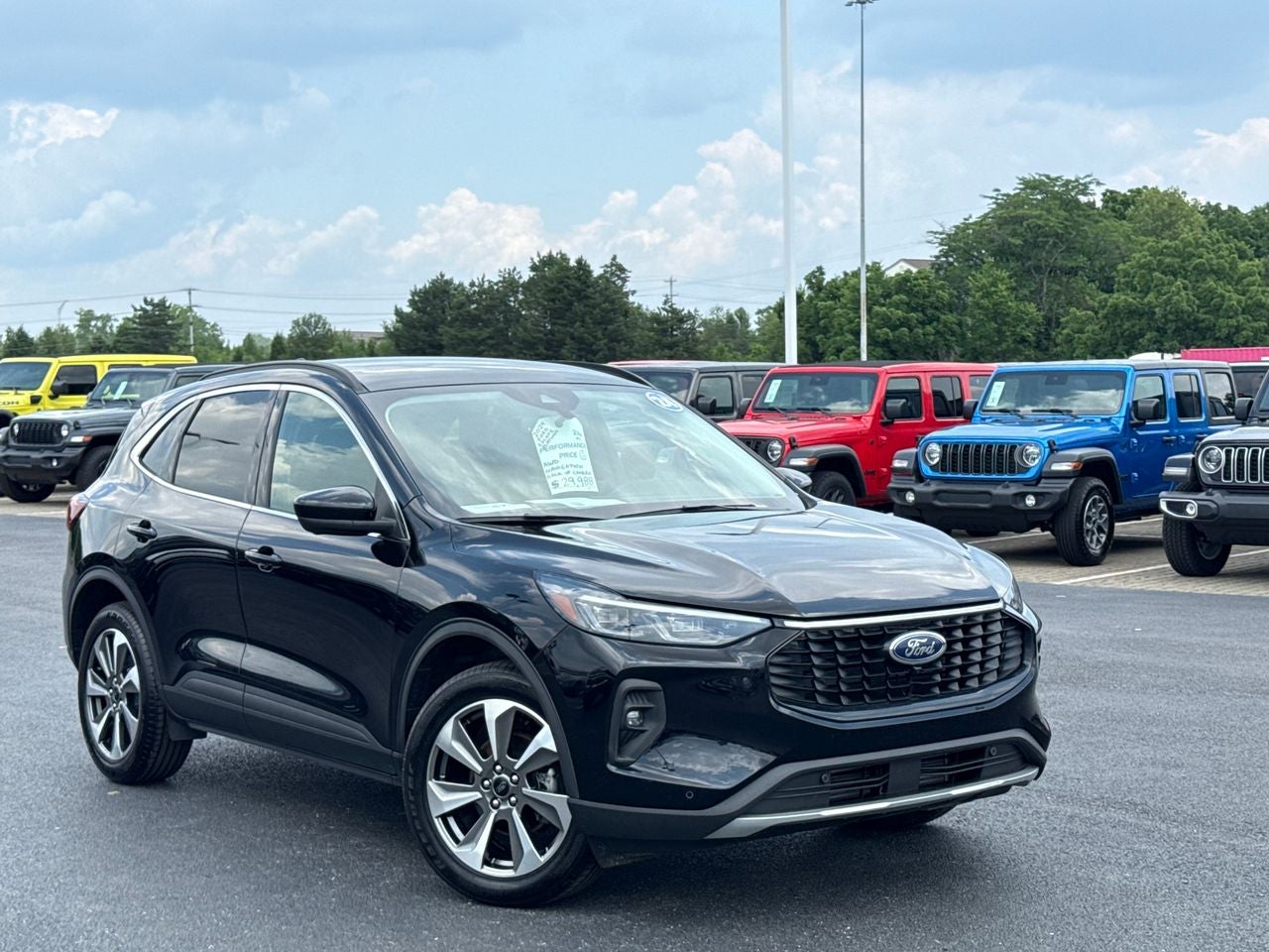 2024 Ford Escape Platinum in Agate Black Metallic — front three-quarter view