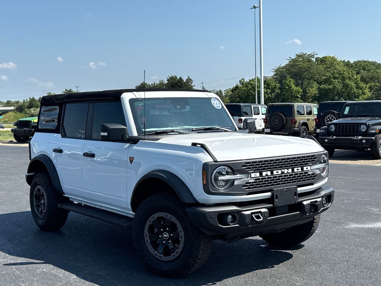 2022 Ford Bronco Badlands in Oxford White — front three-quarter view