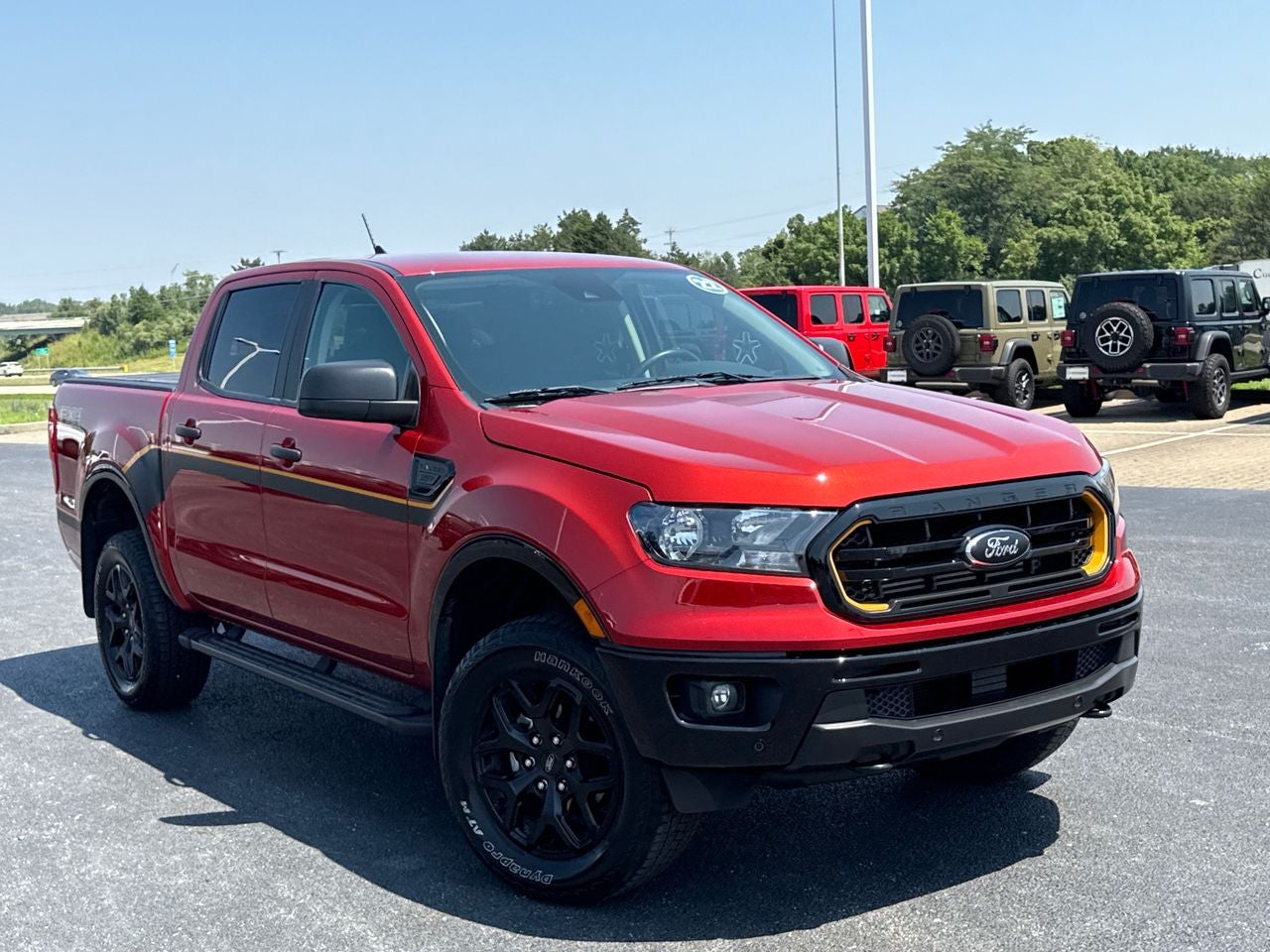 2022 Ford Ranger XLT in Hot Pepper Red Metallic Tinted Clearcoat — front three-quarter view
