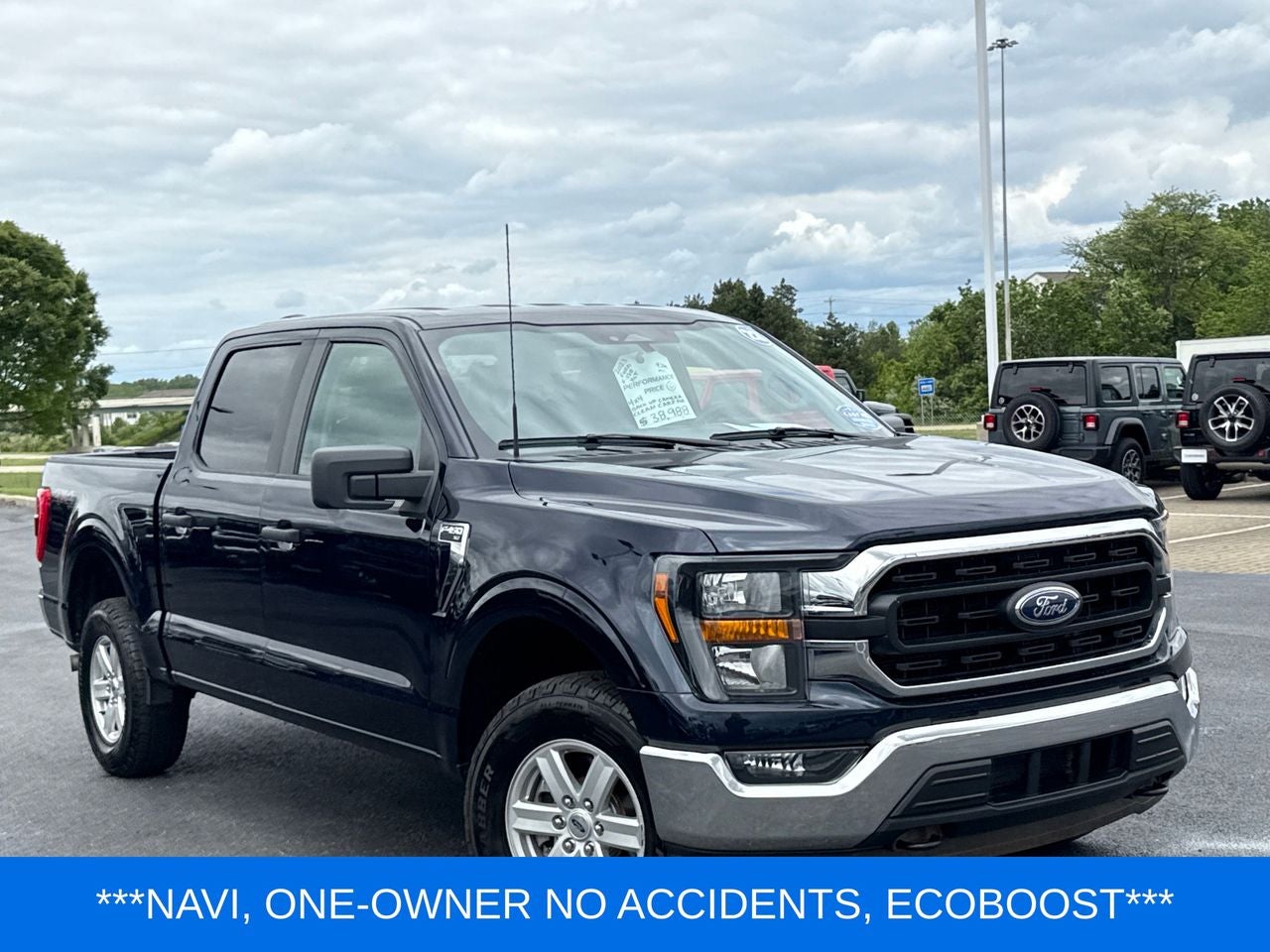 2023 Ford F-150 XLT in Antimatter Blue Metallic — front three-quarter view