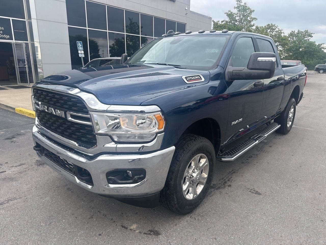 2024 RAM 2500 Big Horn Crew Cab 4x4 6'4' Box in Patriot Blue Pearlcoat — front three-quarter view