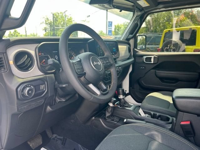 2024 Jeep Wrangler — rear three-quarter view