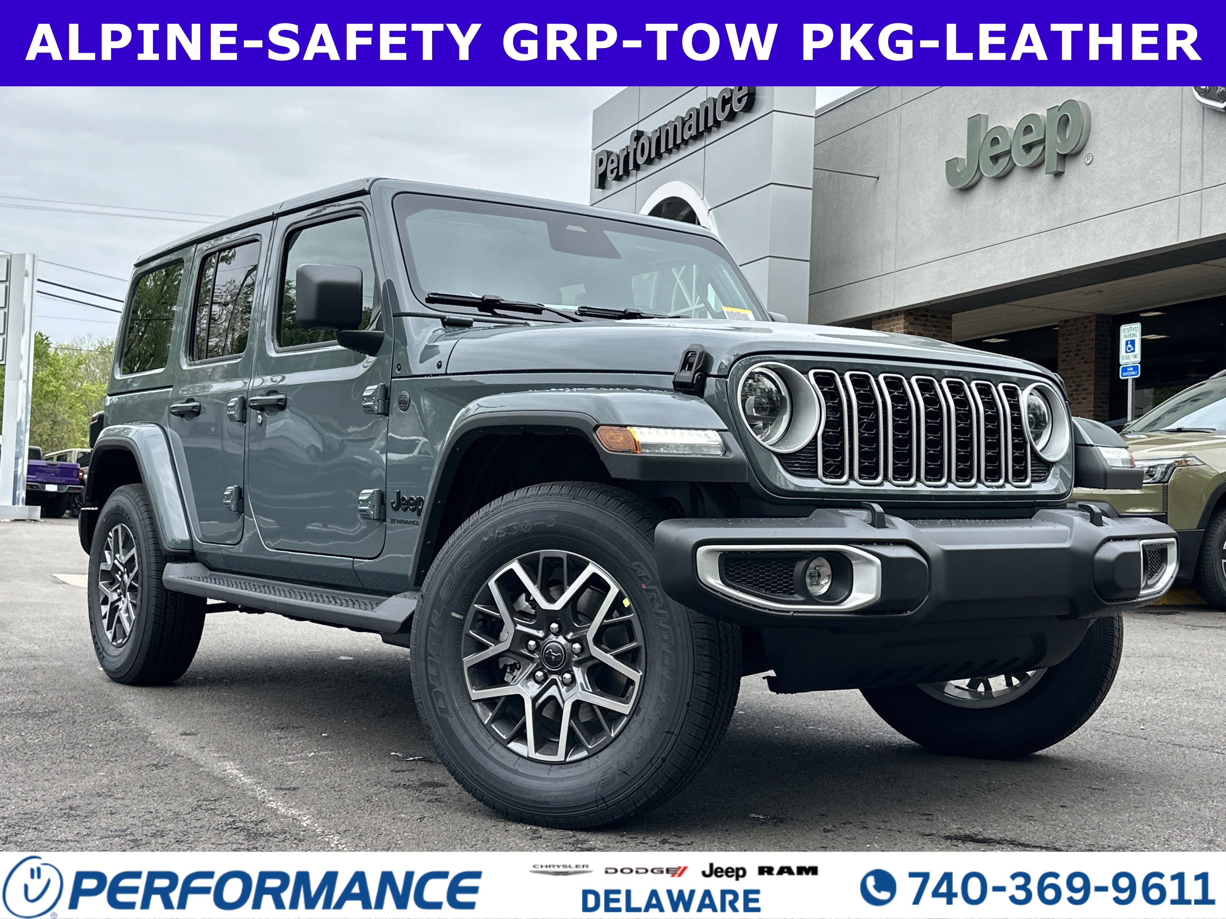 2026 Jeep Wrangler Sahara in Anvil Clear Coat — front three-quarter view