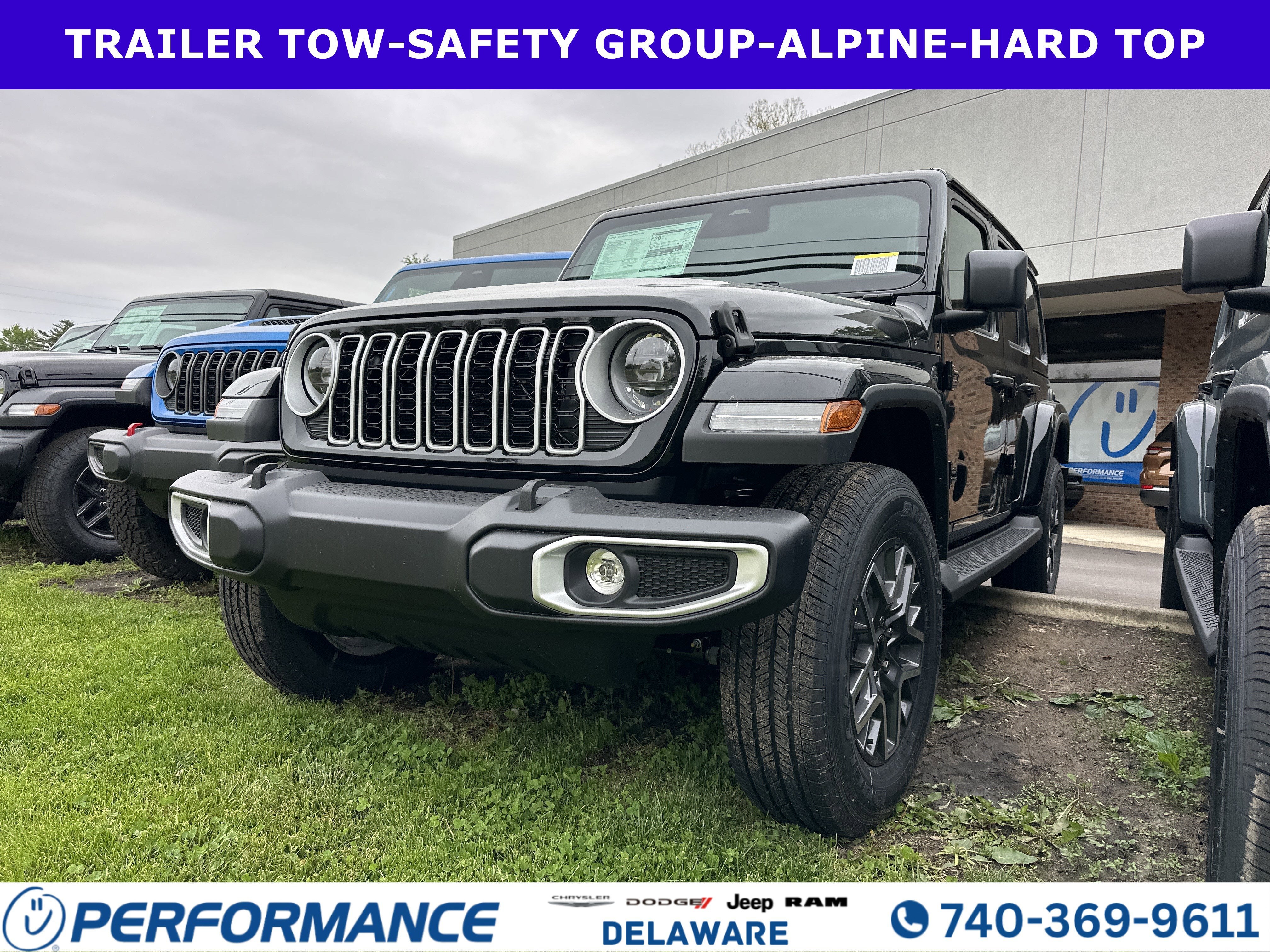2026 Jeep Wrangler Sahara in Black Clearcoat — front three-quarter view