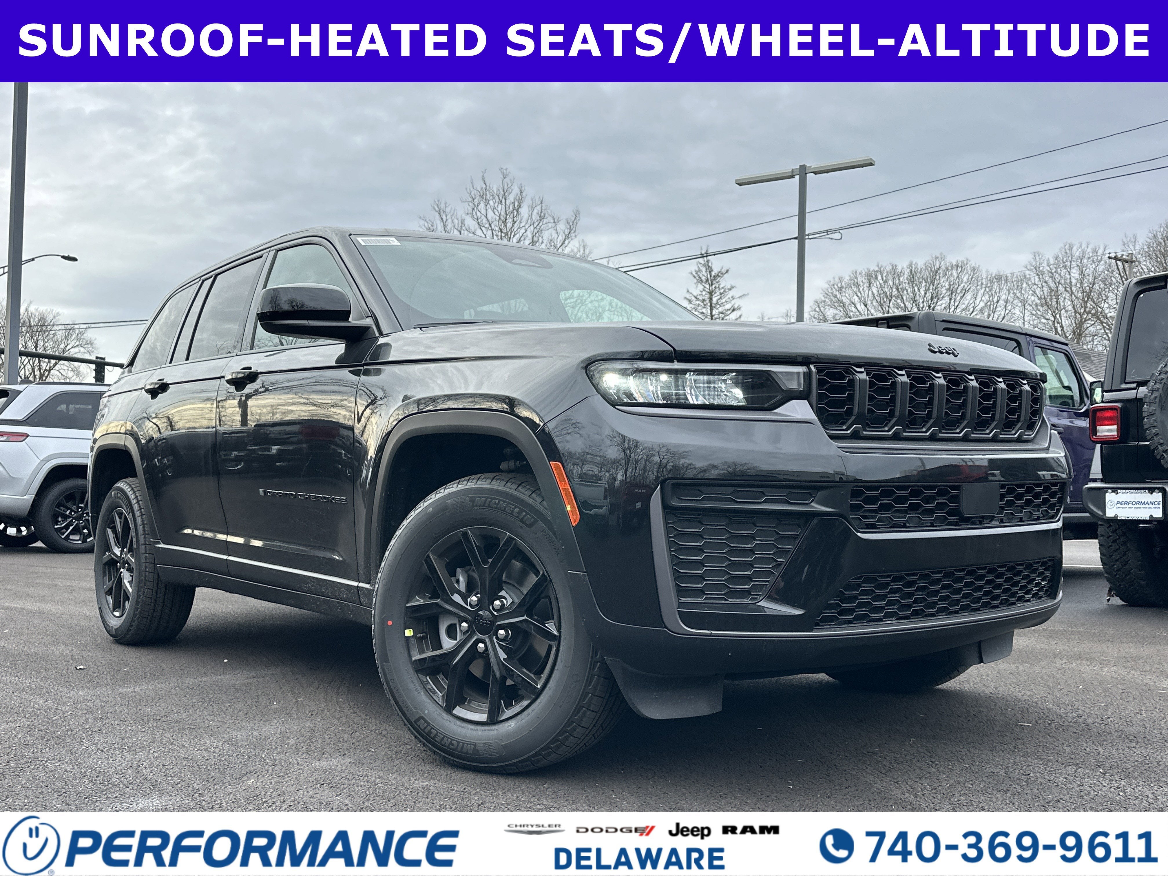 2026 Jeep Grand Cherokee Altitude in Diamond Black Crystal Pearlcoat — front three-quarter view