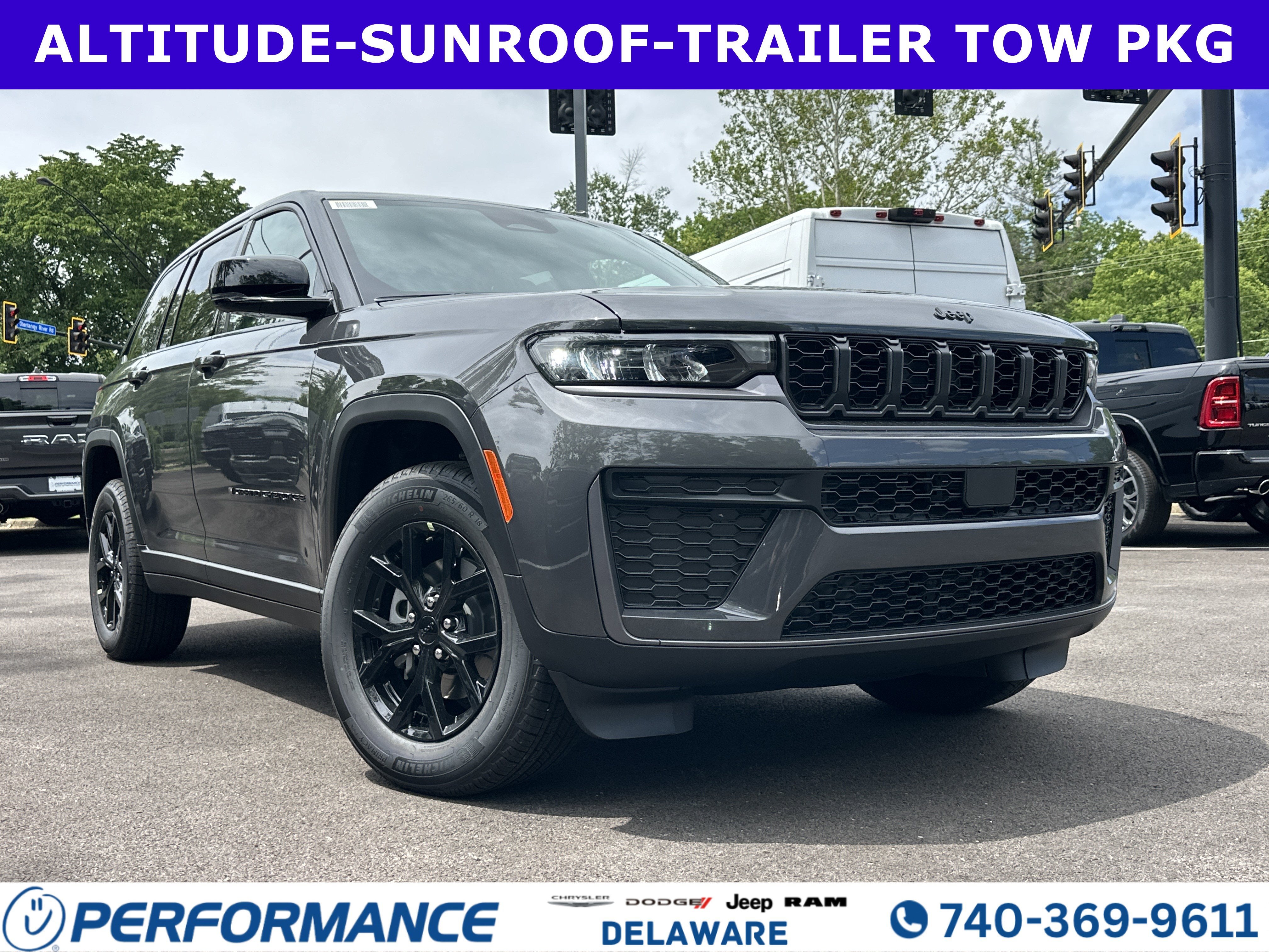 2026 Jeep Grand Cherokee Laredo Altitude in Baltic Gray Metallic Clearcoat — front three-quarter view