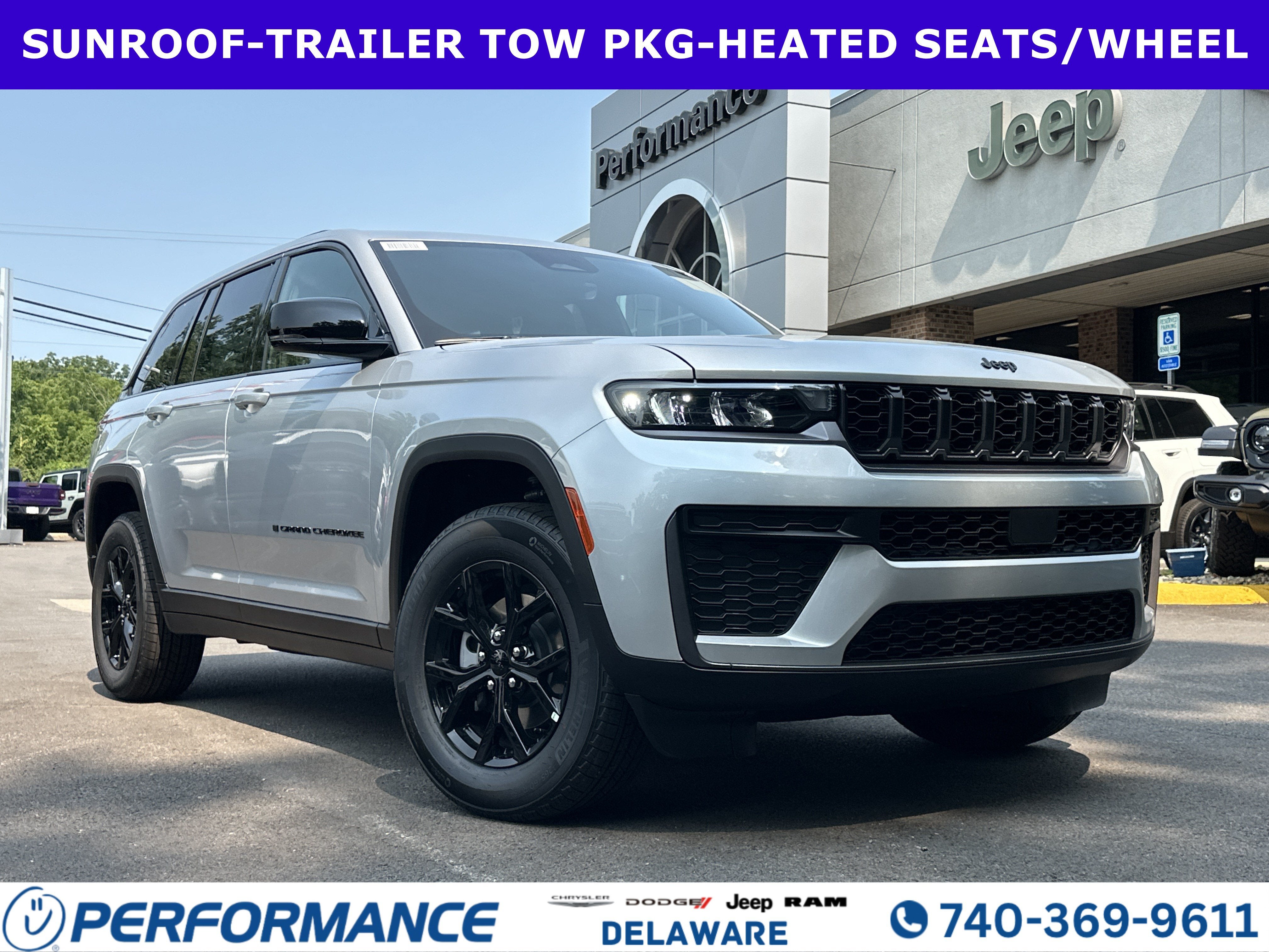 2026 Jeep Grand Cherokee Laredo Altitude in Silver Zynith — front three-quarter view