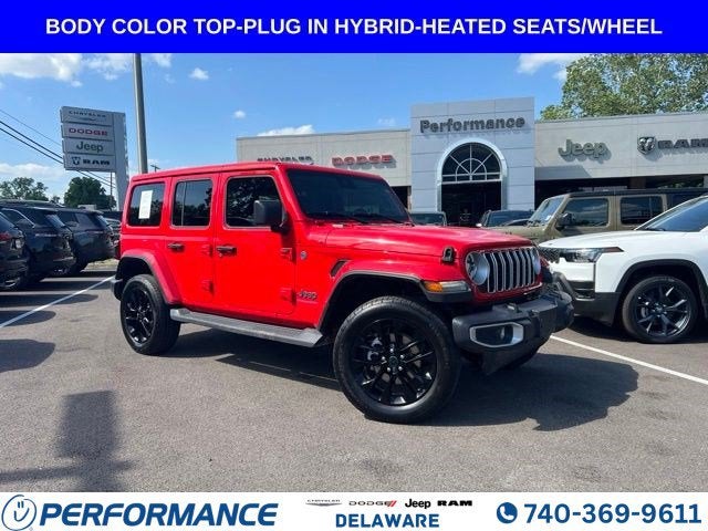 2025 Jeep Wrangler Sahara 4xe in Firecracker Red Clearcoat — front three-quarter view