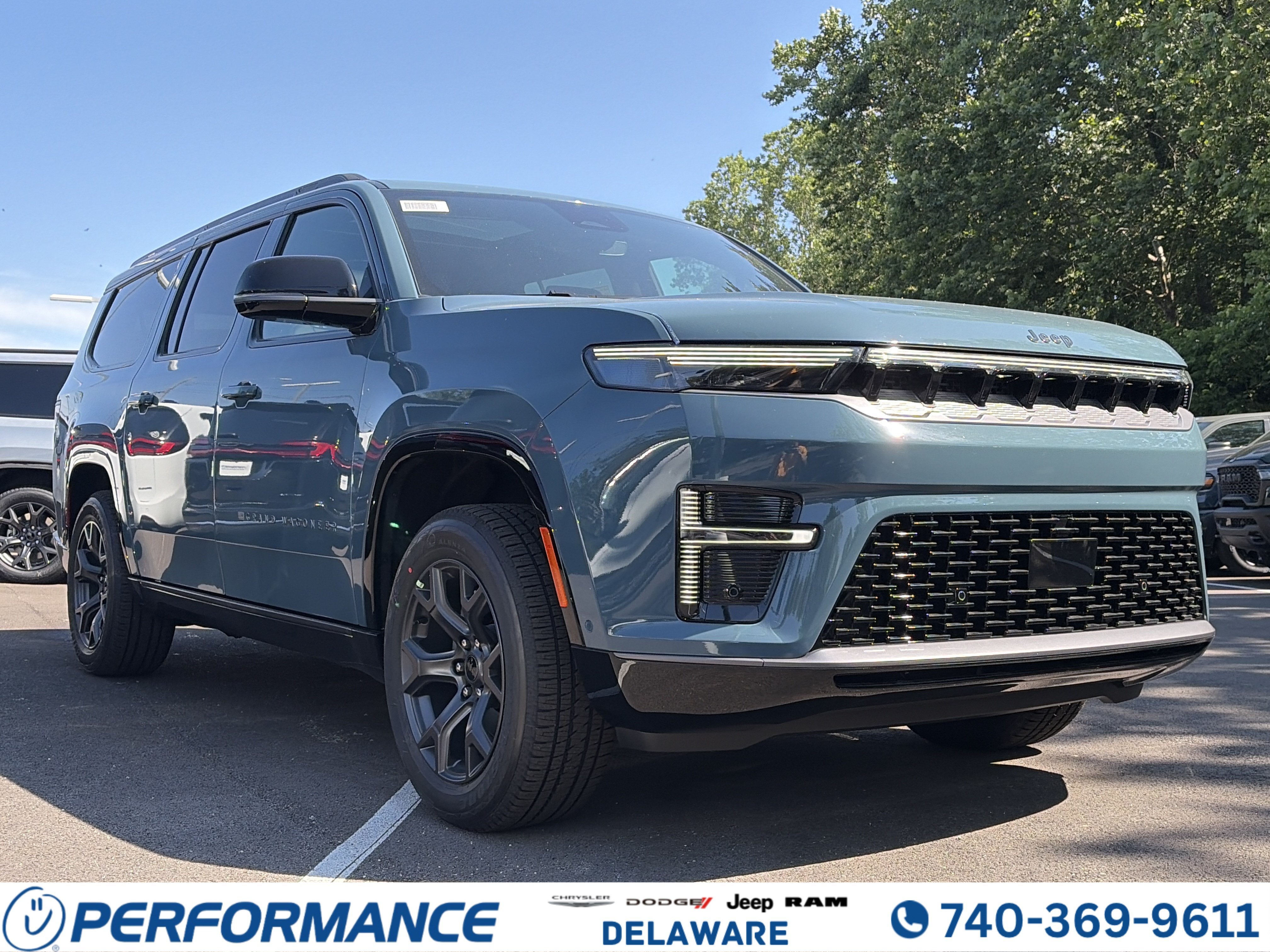 2026 Jeep Grand Wagoneer L Limited Altitude in Steel Blue — front three-quarter view