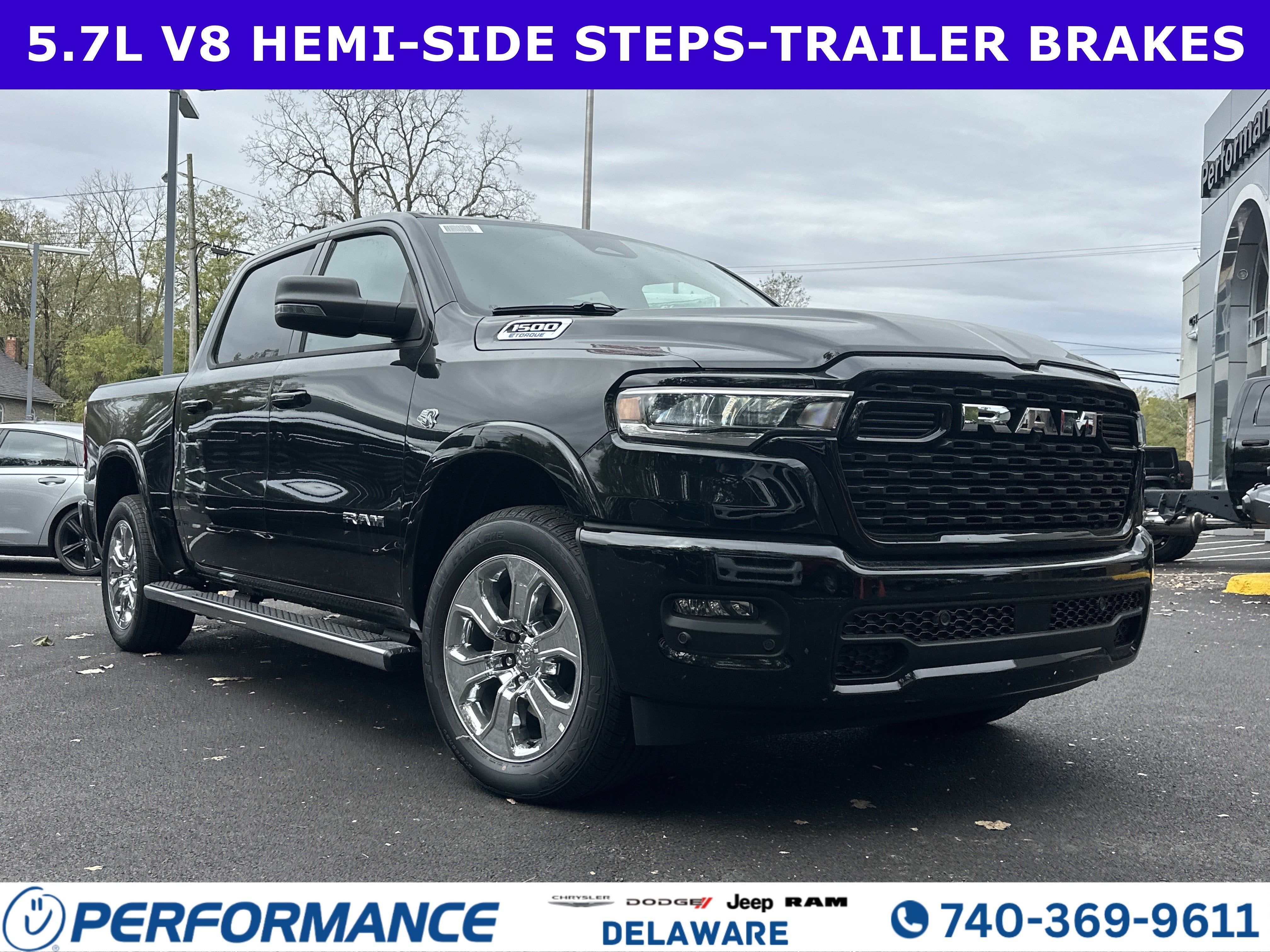 2026 RAM 1500 Big Horn in Diamond Black Crystal Pearlcoat — front three-quarter view