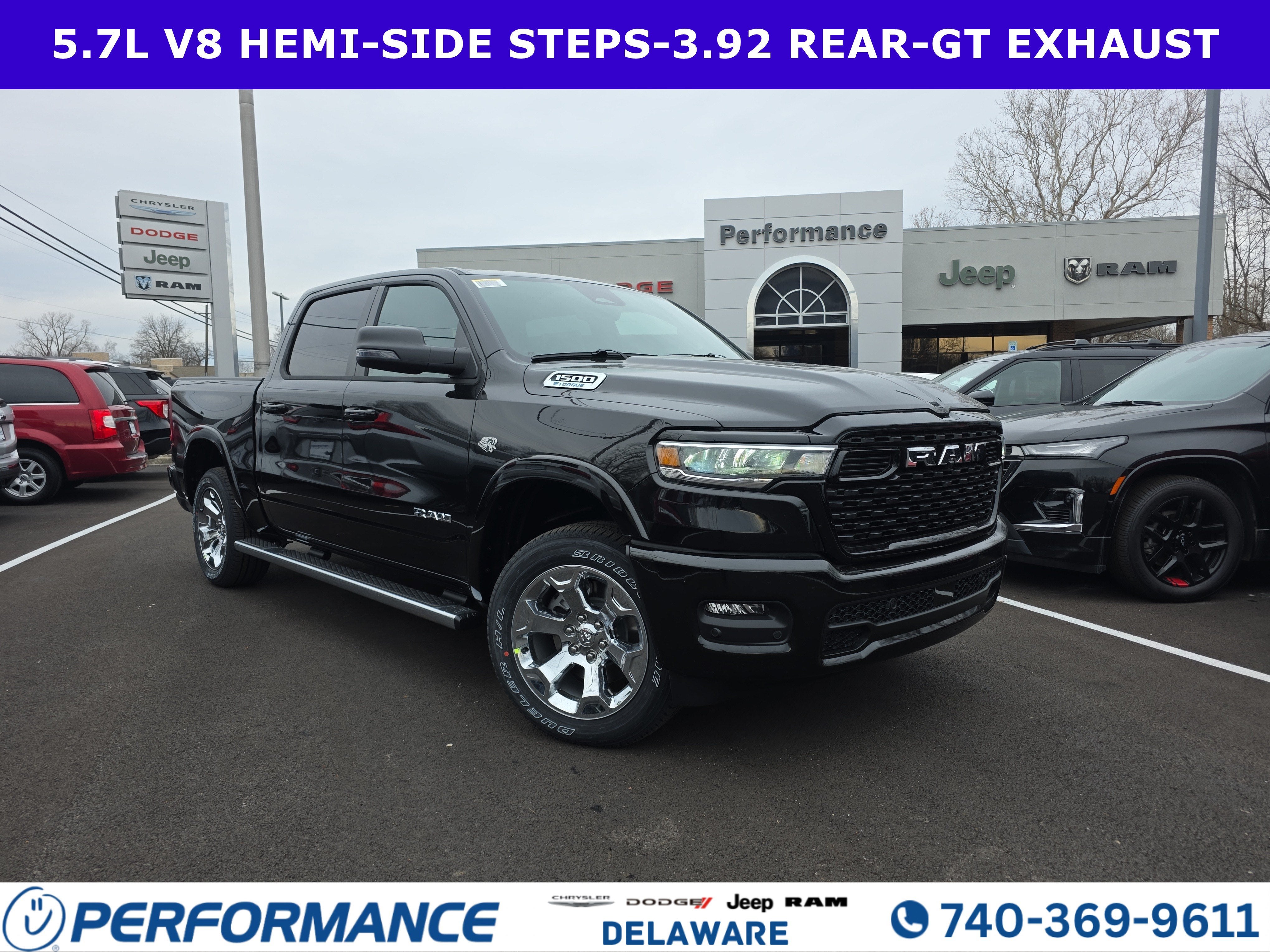 2026 RAM 1500 Big Horn in Diamond Black Crystal Pearlcoat — front three-quarter view