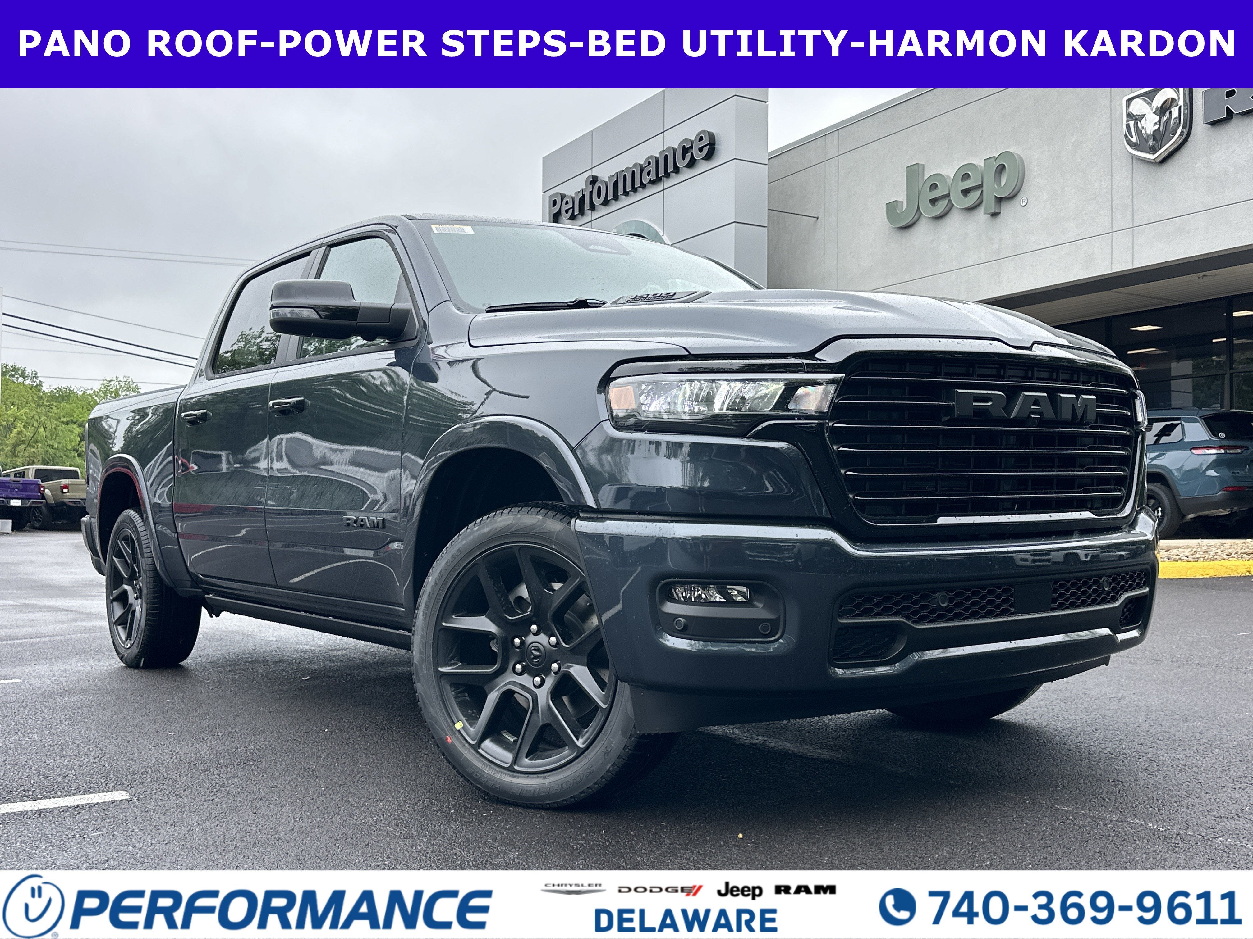 2026 RAM 1500 Laramie in Forged Blue Metallic — front three-quarter view