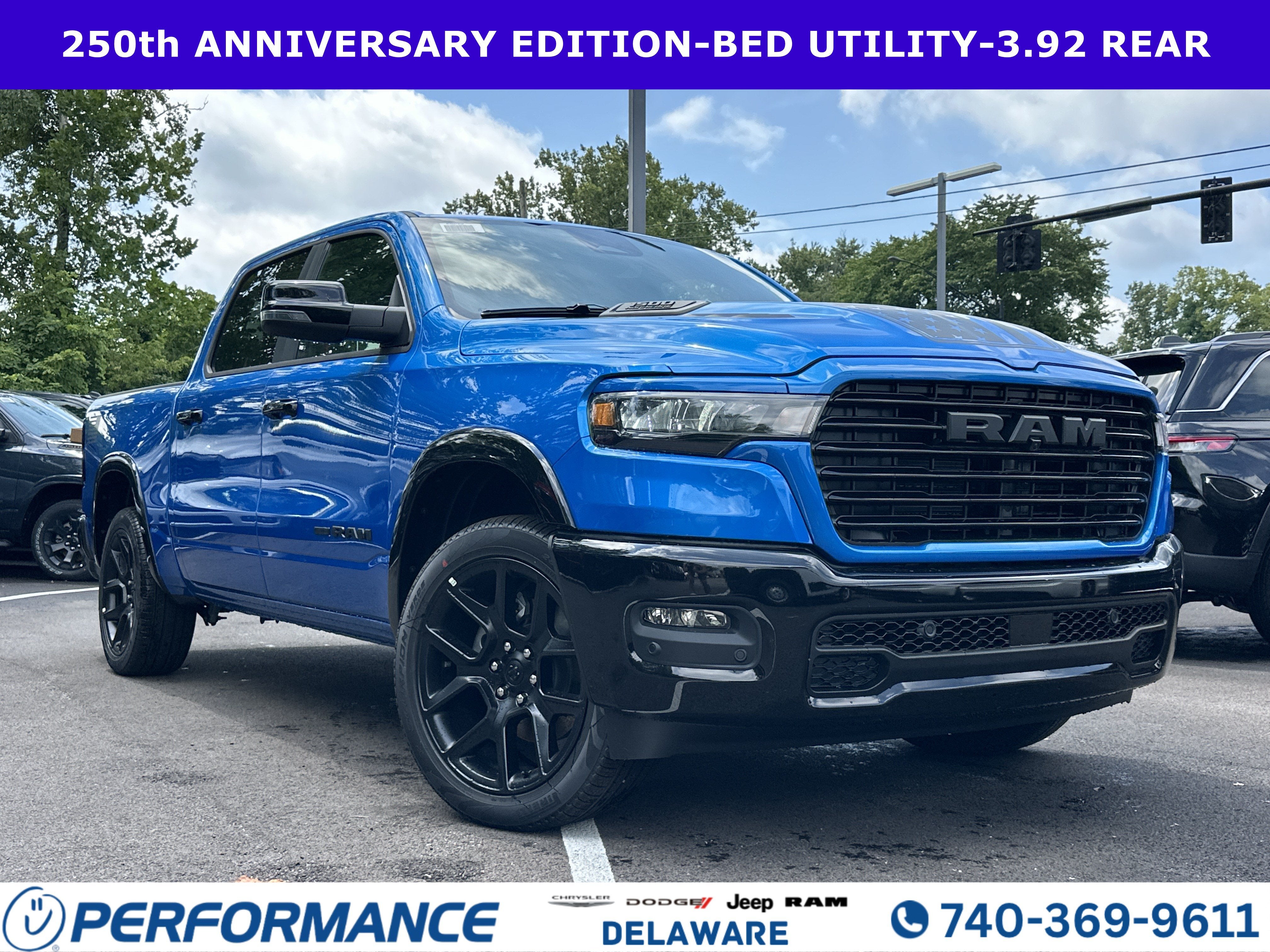 2026 RAM 1500 Laramie in Hydro Blue Pearlcoat — front three-quarter view