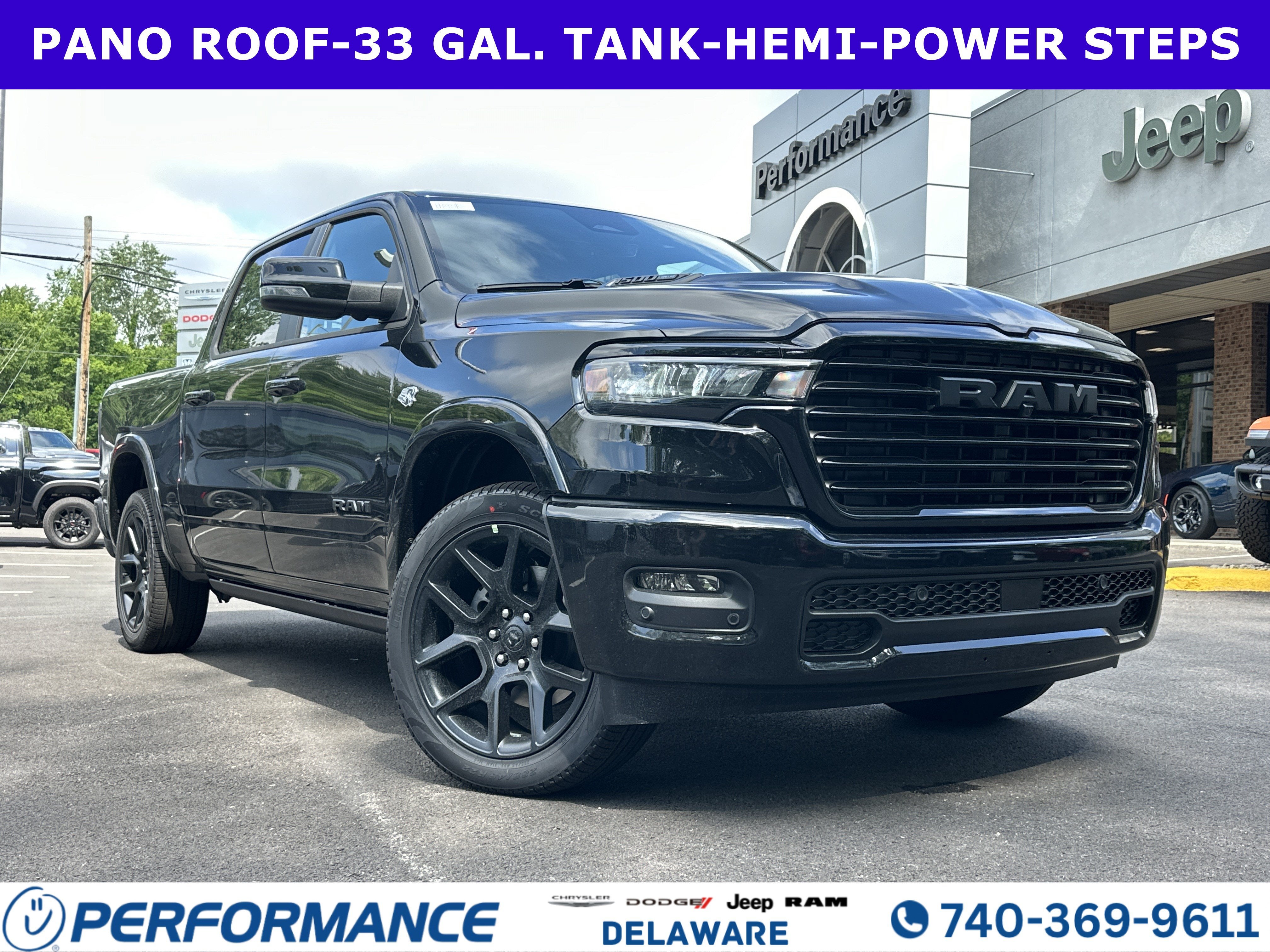 2026 RAM 1500 Laramie in Diamond Black Crystal Pearlcoat — front three-quarter view
