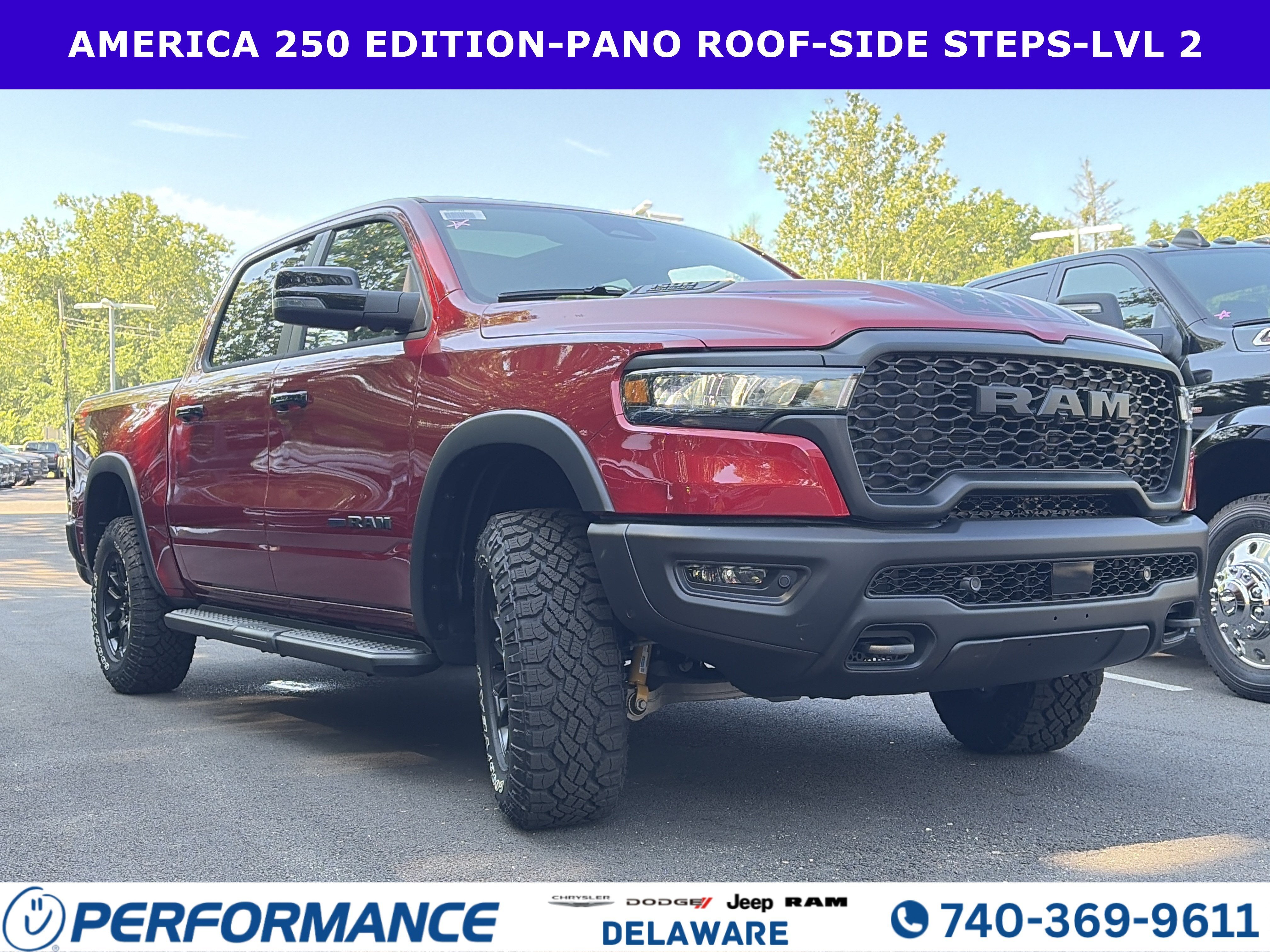 2026 RAM 1500 Rebel in Molten Red Pearlcoat — front three-quarter view