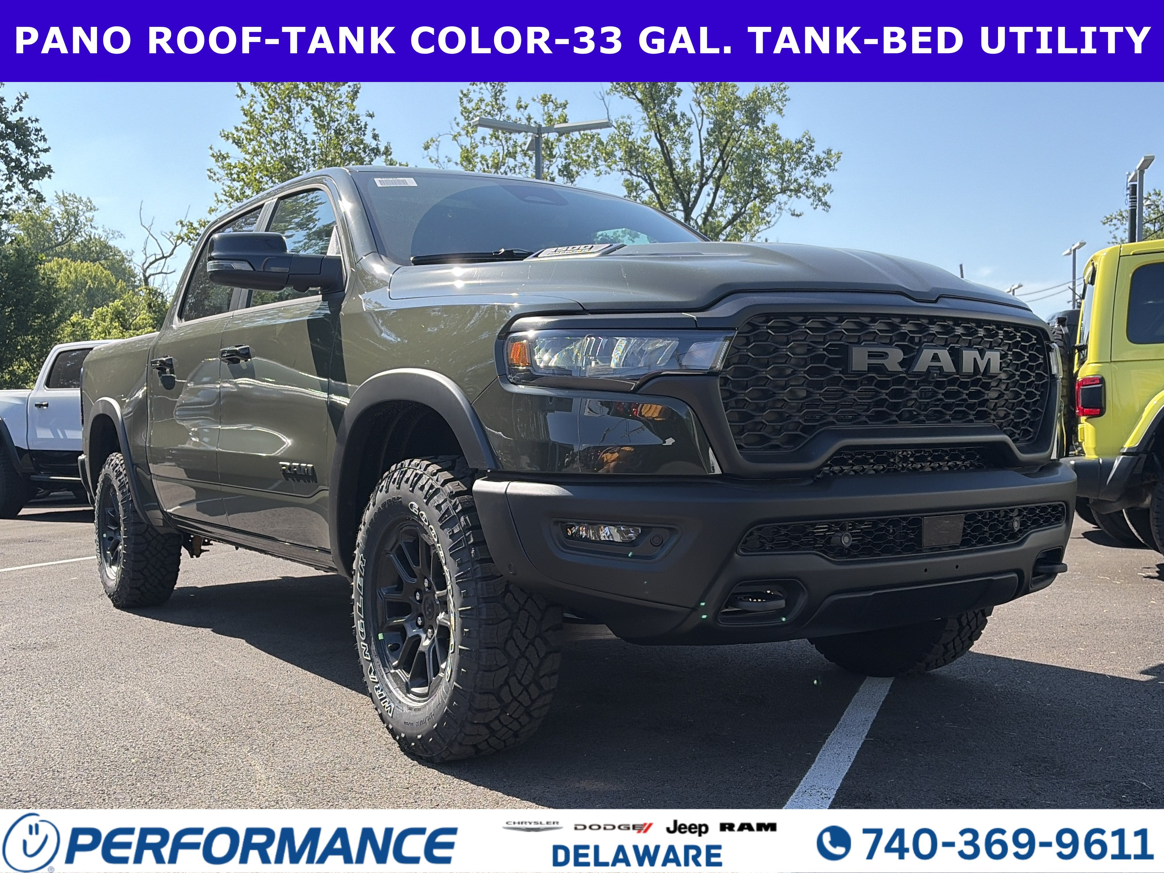 2026 RAM 1500 Rebel in Tank — front three-quarter view
