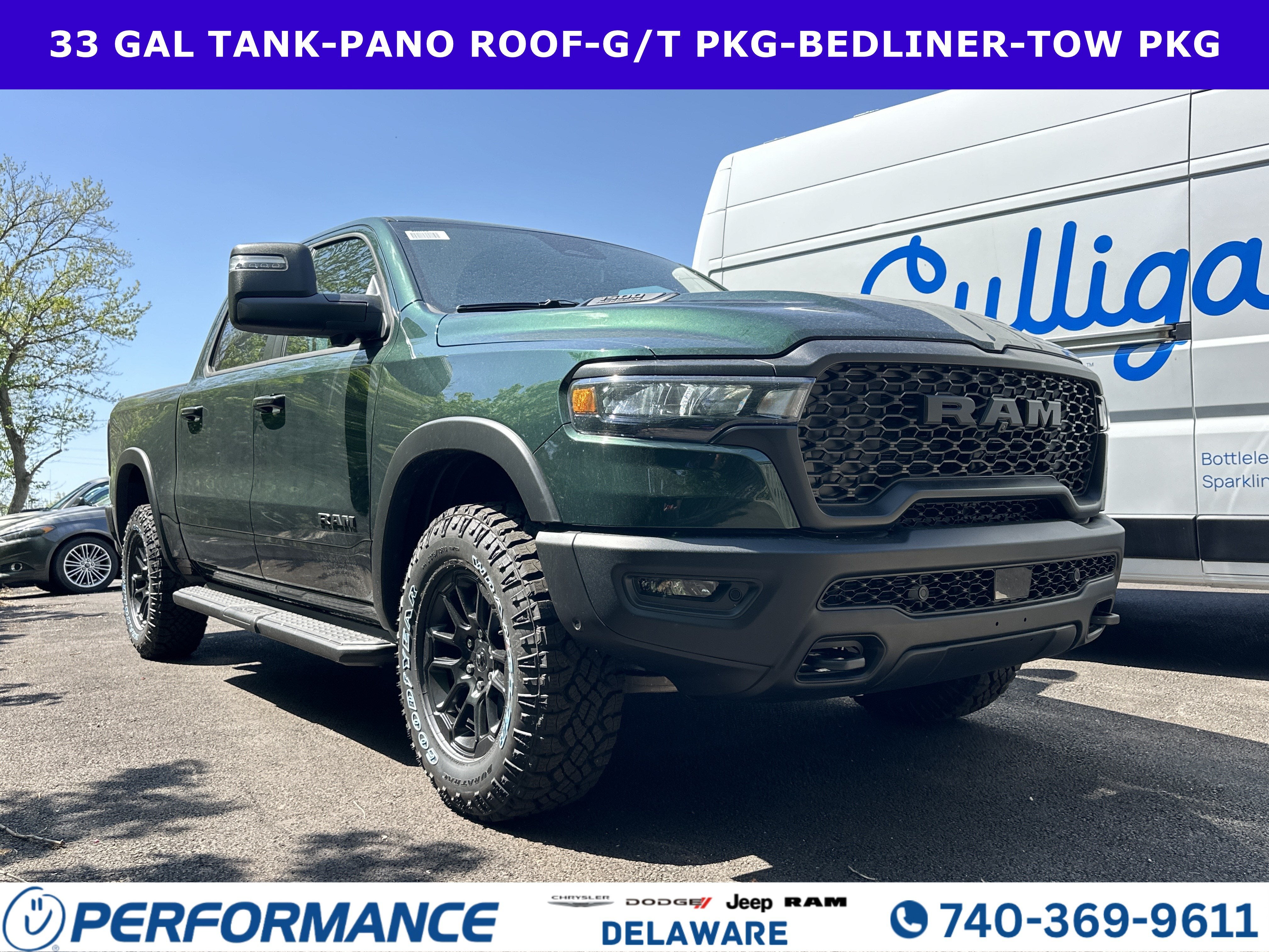 2026 RAM 1500 Rebel in Serrano Green Metallic — front three-quarter view