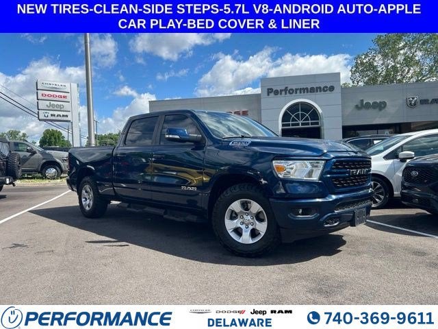 2022 RAM 1500 Big Horn/Lone Star in Patriot Blue Pearlcoat — front three-quarter view
