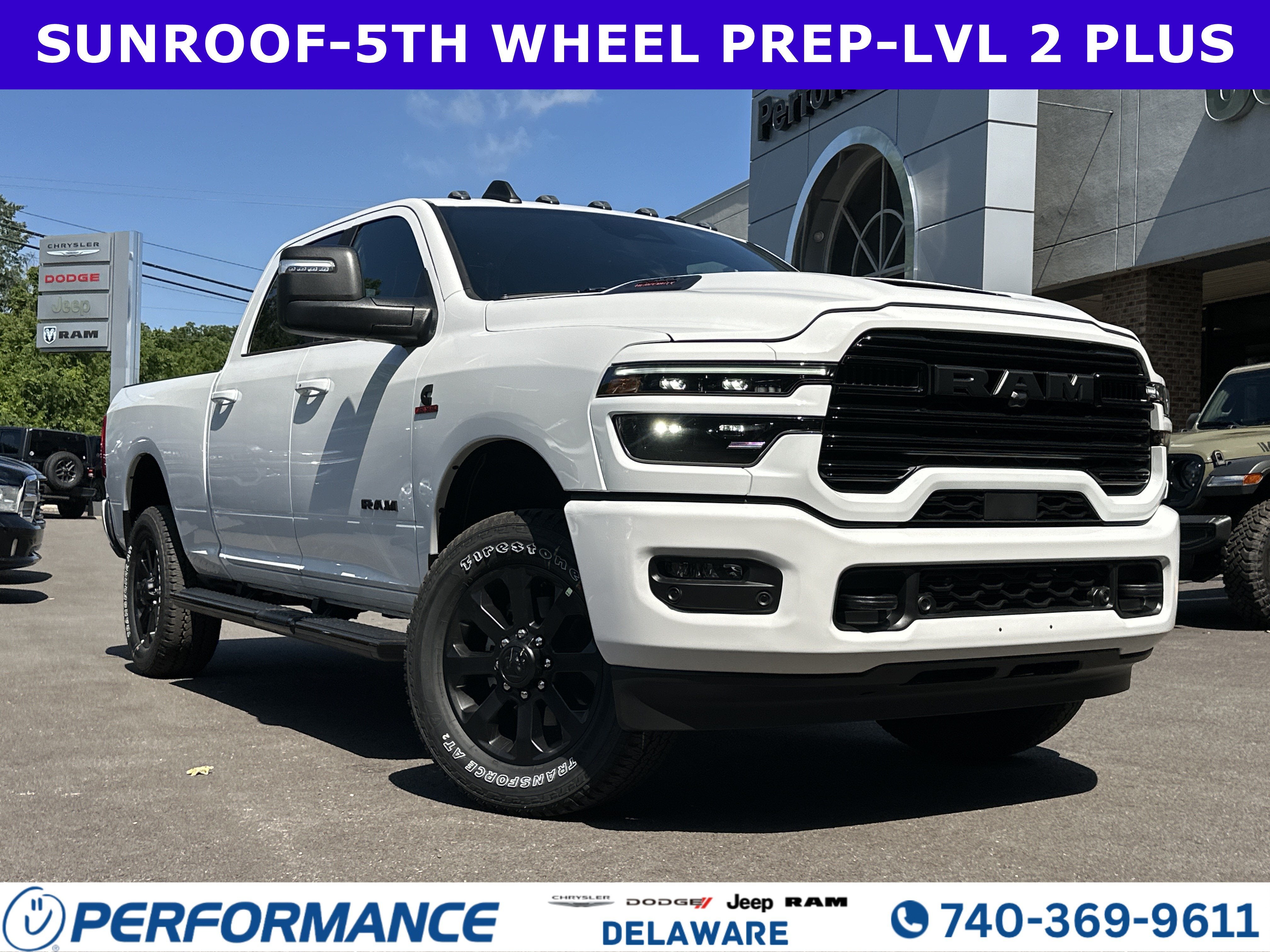 2026 RAM 2500 Laramie in Bright White Clearcoat — front three-quarter view