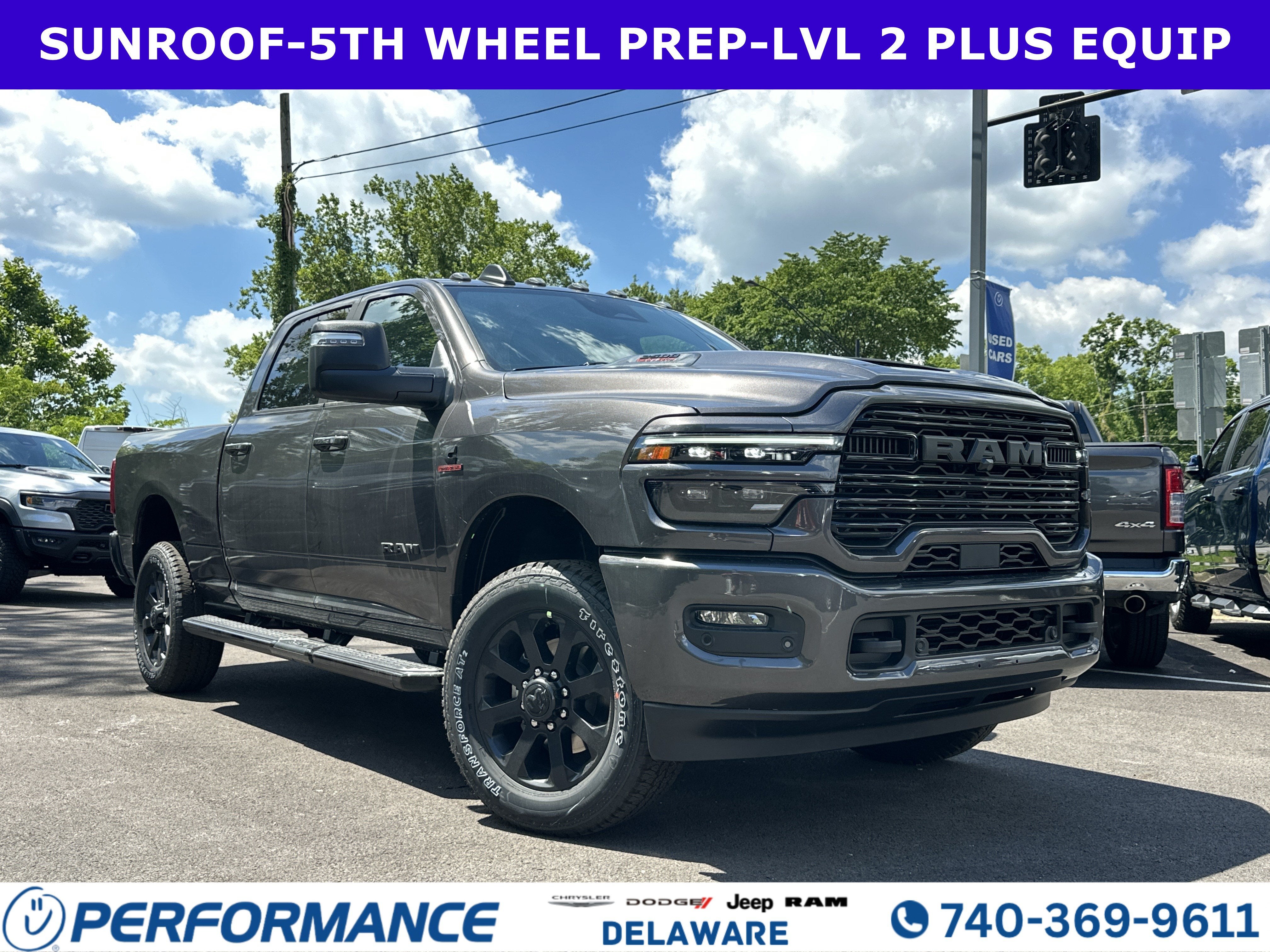 2026 RAM 2500 Laramie in Granite Crystal Metallic Clearcoat — front three-quarter view