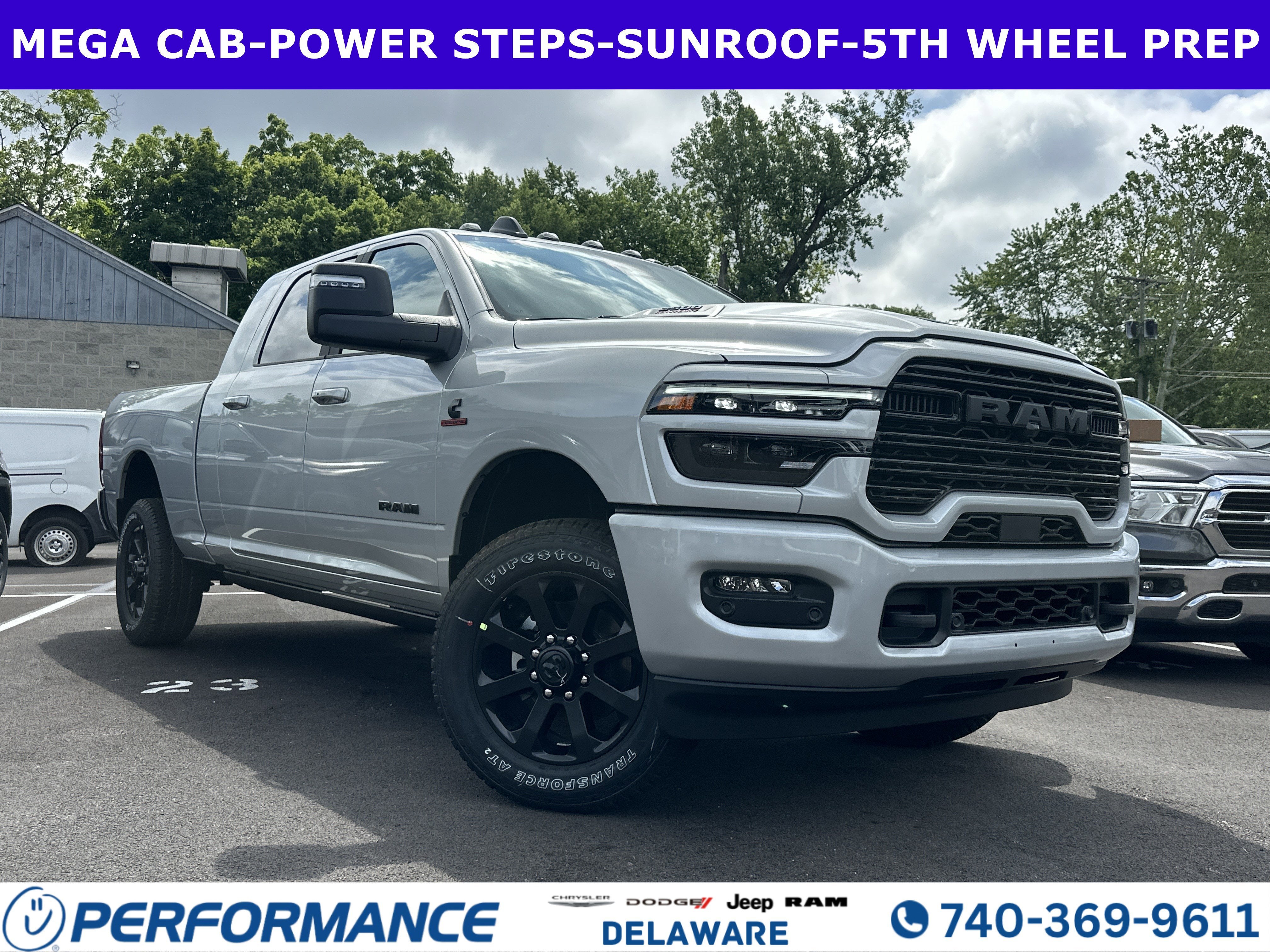 2026 RAM 2500 Laramie in Silver Zynith — front three-quarter view
