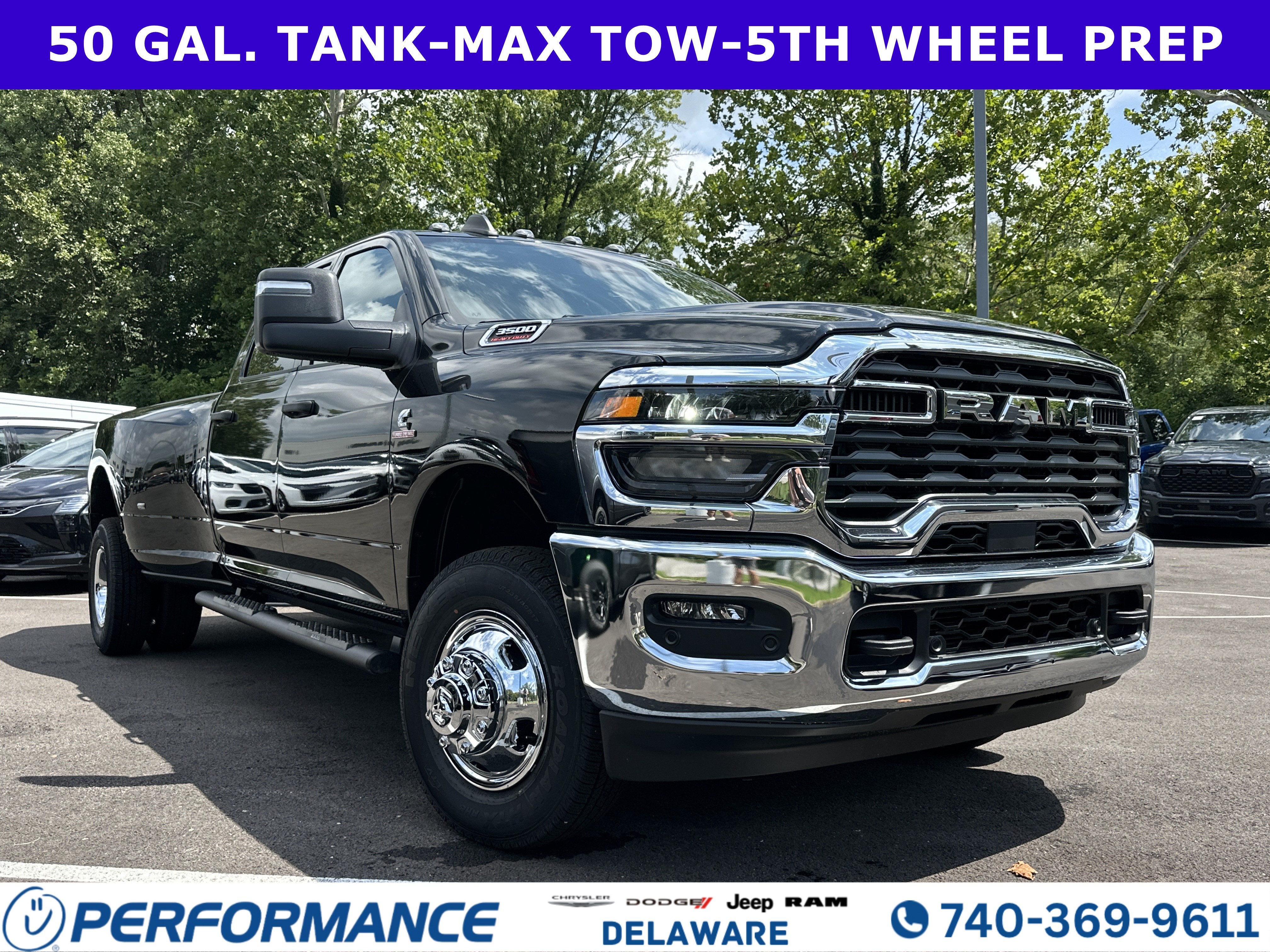 2026 RAM 3500 Tradesman in Diamond Black Crystal Pearlcoat — front three-quarter view